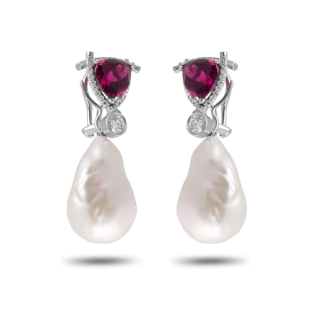 The combination of the rubellite, the diamonds and the Baroque Pearls create a beautiful contrast. The lustrous Baroque pearl, the bright 3.25 carat diamonds and 4.60 carat total Rubellite make this earrings edgy, bold, and sure to make a statement.
