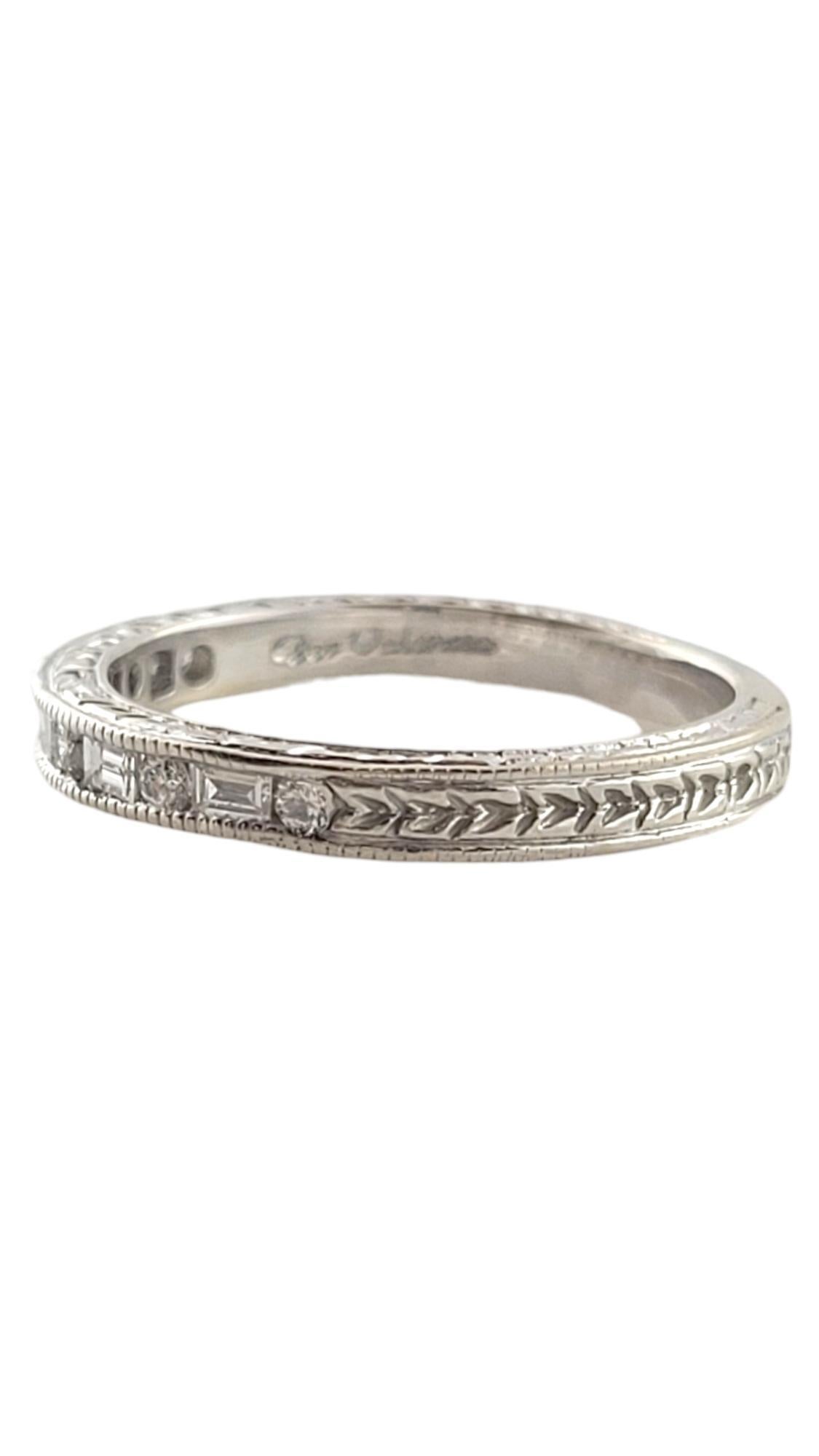 18K White Gold Dev Valencia Diamond Band Ring Size 7-7.25

This stunning ring by Dev Valencia was crafted with stunning detailing from 18K white gold and features 5 beautiful baguette cut diamonds and 6 sparkling round brilliant cut diamonds in an