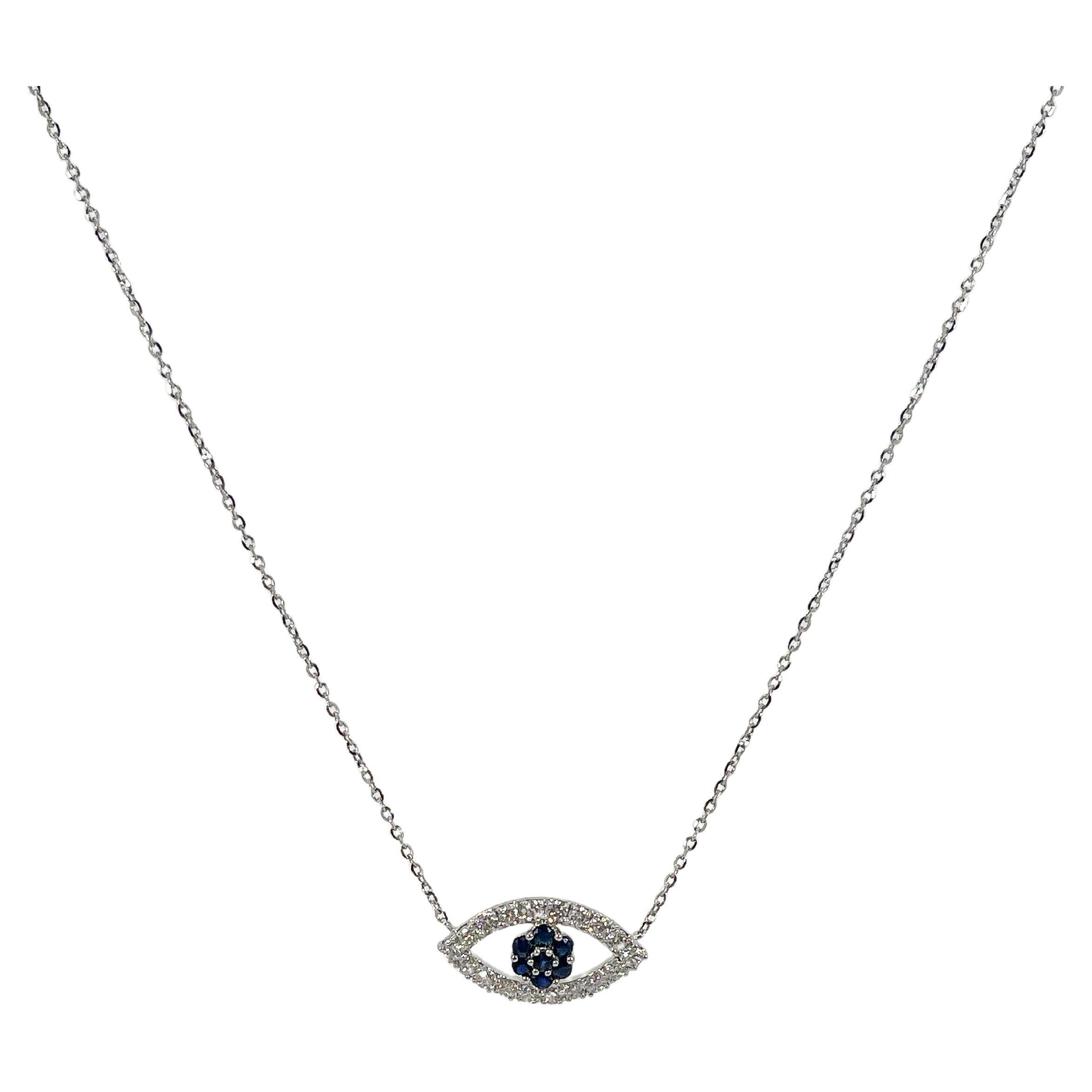 18K White Gold Diamond .50 CTW and Sapphire .25 CTW Evil Eye Pendant Necklace For Sale
