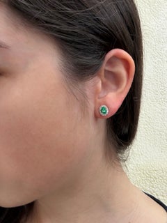 18K White Gold Diamond and .76 Carat Oval Emerald Cluster Stud Earrings