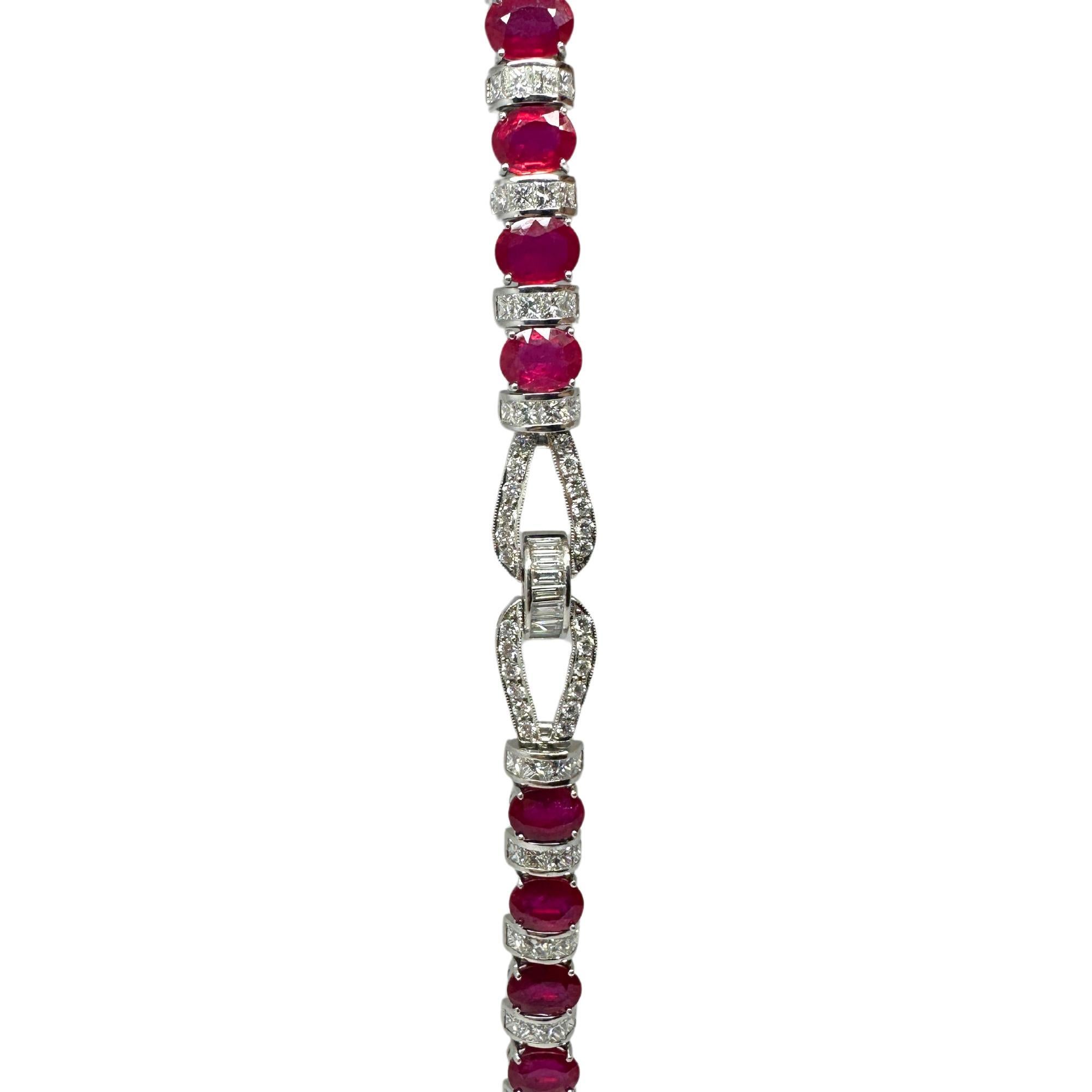 18K White Gold Diamond and African Ruby Bracelet
Condition: In good condition with some minor surface wear consistent with age.
Length: 7.5 inches
Metal: 18k White Gold
Weight: 29 grams
Diamonds = 6.96 carats 
Ruby: 20.04 carats