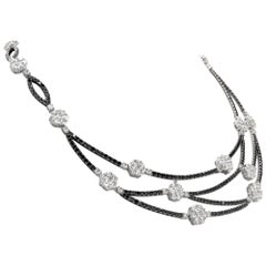 18k white gold Diamond and Black Sapphire Necklace with matching earring jackets