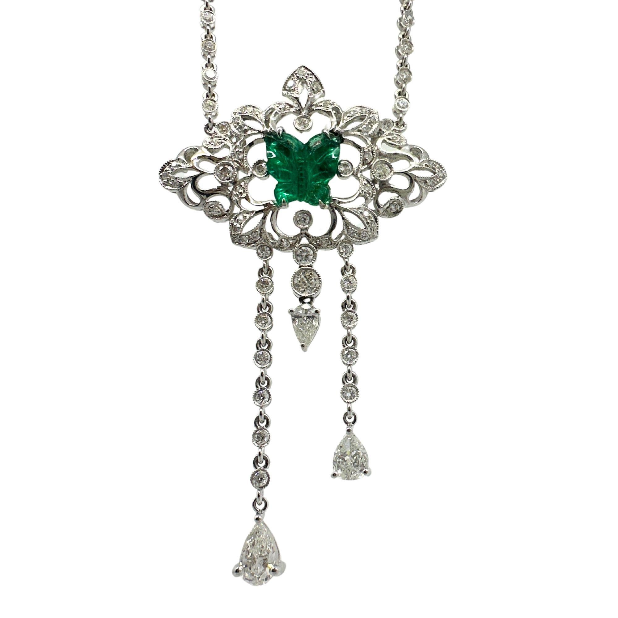 18K White Gold Diamond and Butterfly Shaped Emerald Necklace
Condition: In good condition with some minor surface wear consistent with age.
Chain Length: 14.5 inches
Pendant: 2.5 inches
Markings: 