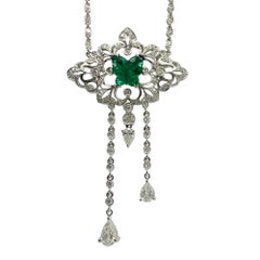 18K White Gold Diamond and Butterfly Shaped Emerald Necklace