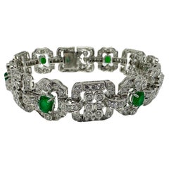 Bracelet en or blanc 18K avec diamants et émeraudes