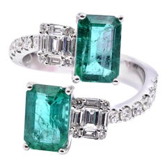 18 Karat White Gold Diamond and Emerald Bypass Ring