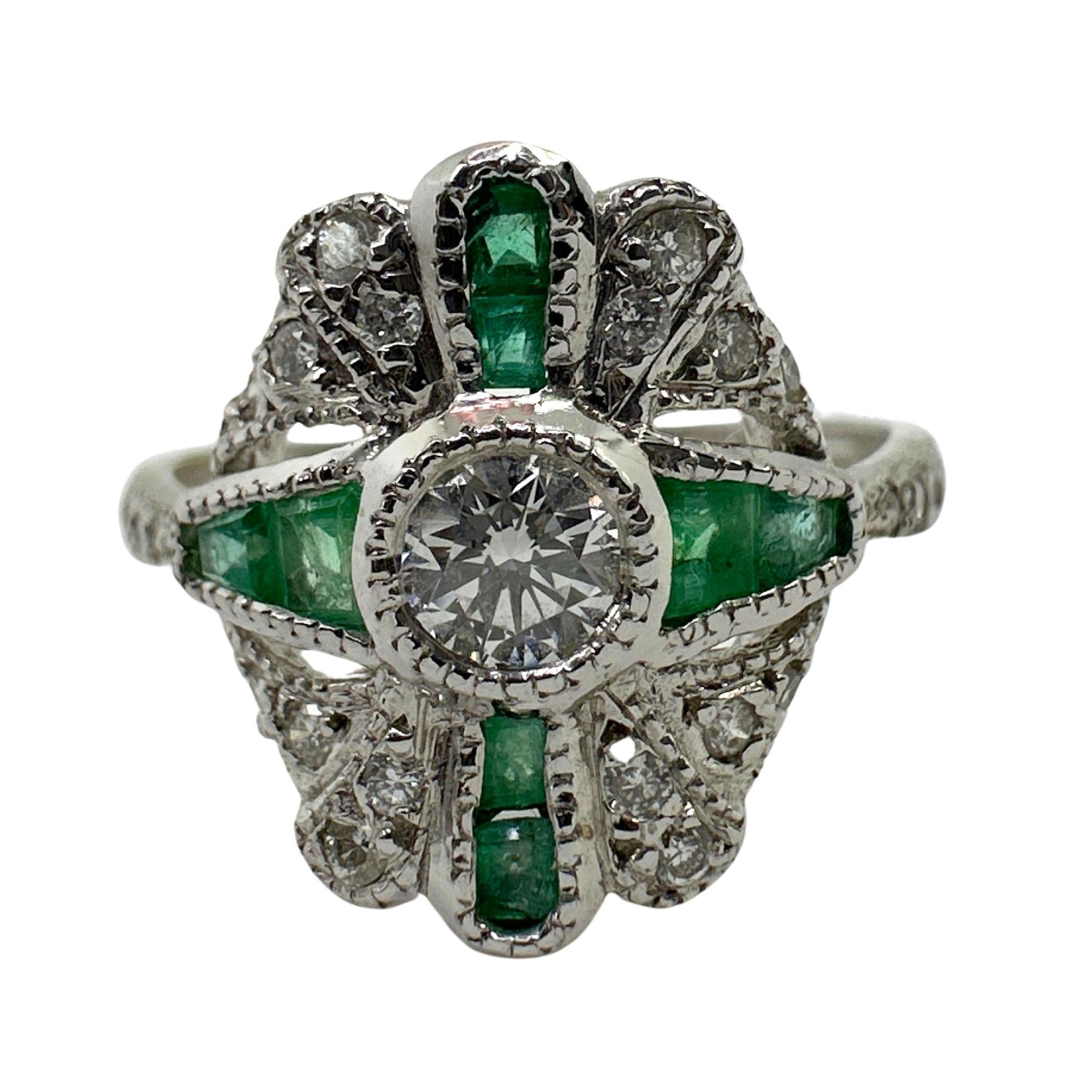 This 18k diamond and emerald ring is a stunning addition to any jewelry collection. Made of 18k white gold and featuring a 0.23 carat diamond center and 0.16 carat diamond accents, it also boasts beautiful 1.65 carats of emeralds. 

18k Diamond and