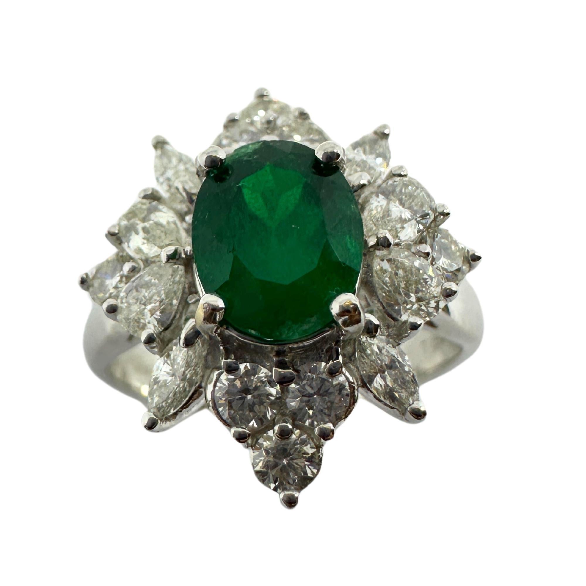 18k Diamond and Emerald Ring. 
Condition: In good condition with some minor surface wear consistent with age.
Ring size: 6.25
Markings: “18k