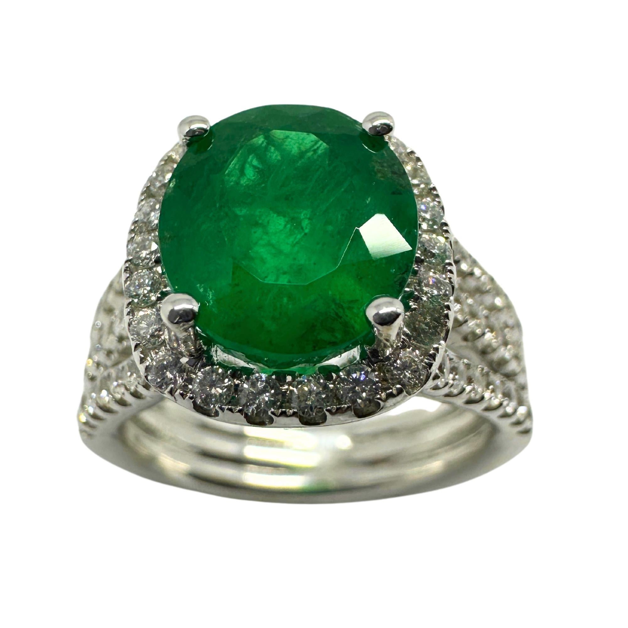 Elevate your jewelry collection with our 18k white gold Diamond and Emerald Ring. The sparkling 0.56 carat diamonds and vibrant 3.21 carat emerald are expertly crafted in a size 6.25 ring, weighing only 8.4 grams. Make a statement with this