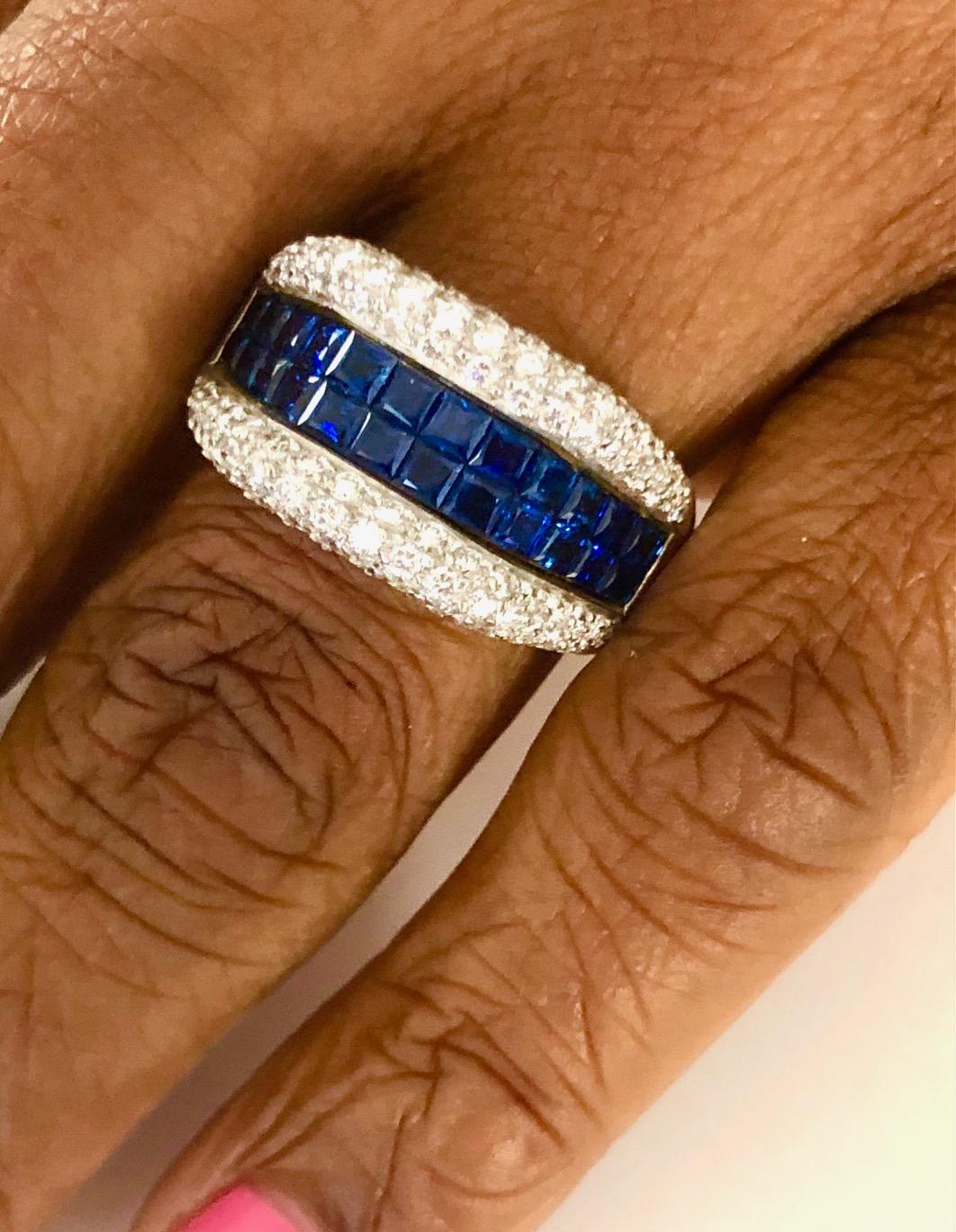 Beautiful and well made in 18K White Gold Ring set with 118 Diamonds 1.48 carats and 24 Invisible set Square Sapphires 3.26 carats.

We design and manufacture our jewelry in our workshop, located in New York City's diamond district.