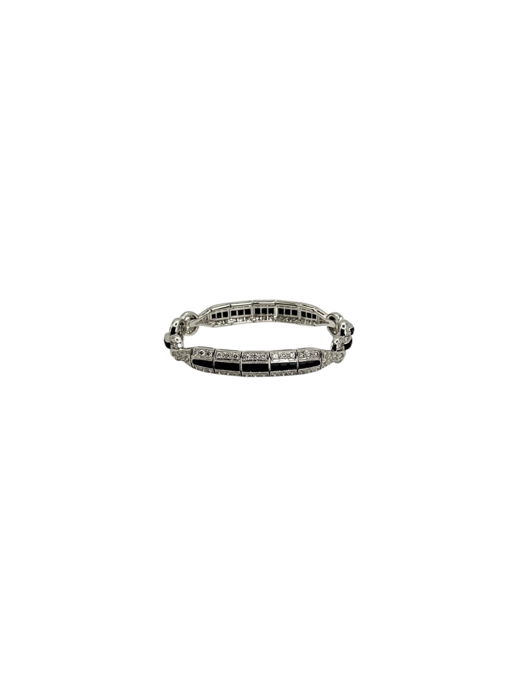 18K White Gold Diamond and Onyx Bracelet 139 brilliant cut diamonds totaling approximately 3.76 carats and 46 onyxes 