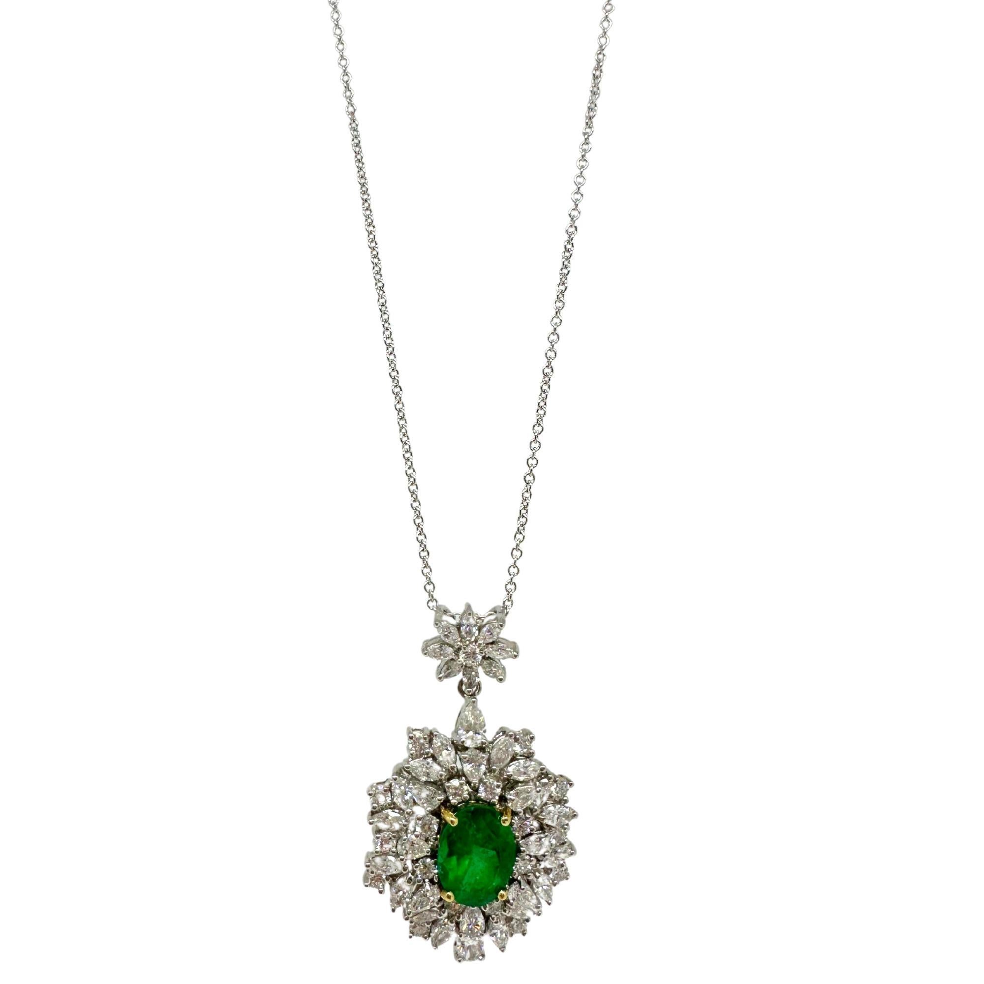18K White Gold Diamond and Oval Cut Emerald Pendant Necklace
Condition: In good condition with some minor surface wear consistent with age.
Length: 18 inch chain, 1.50 inch pendant
Metal: 18K White Gold
Weight: 12.50 grams
Diamonds: 3.11