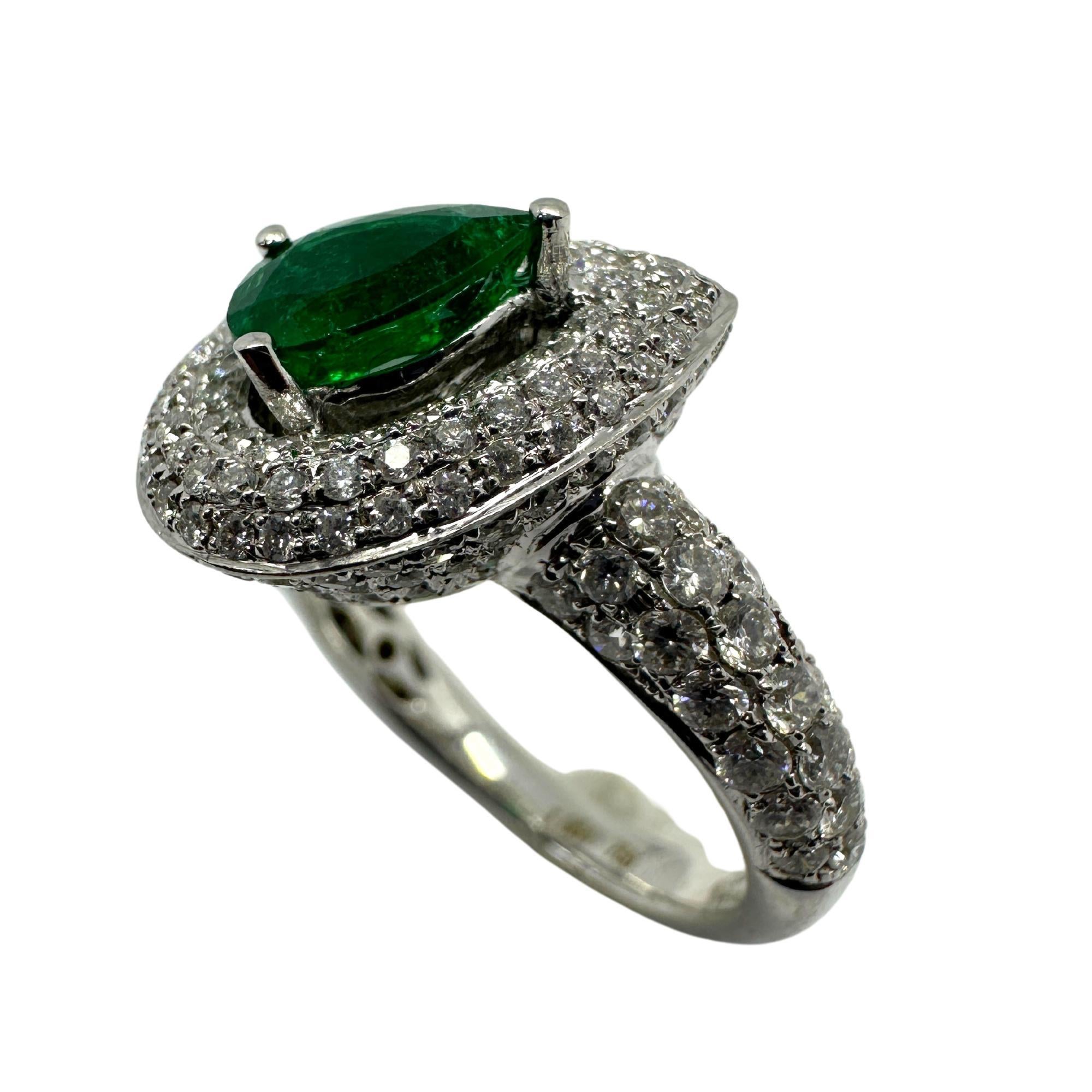 Modern 18k White Gold Diamond and Pear Shaped Emerald Ring For Sale