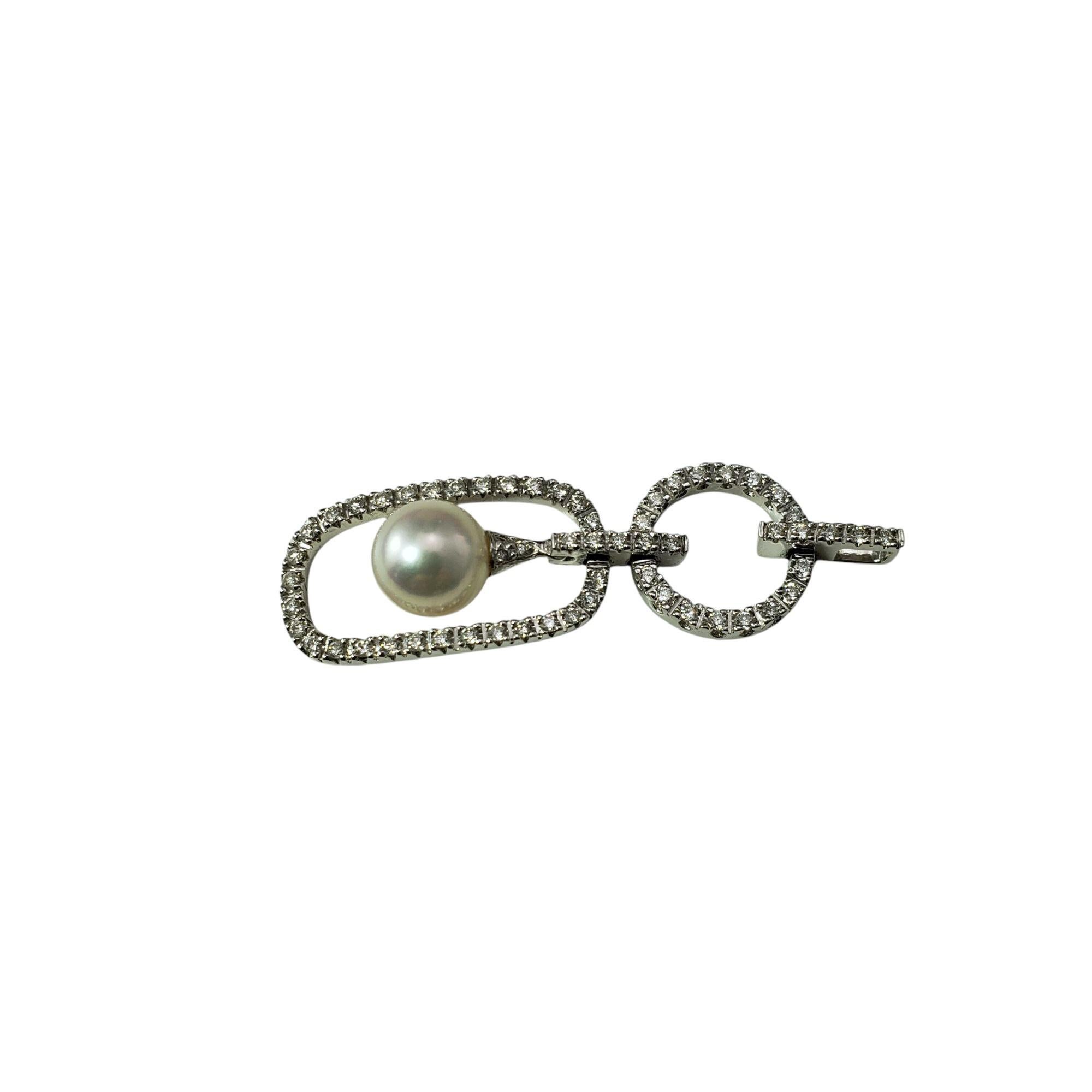 18K White Gold Diamond and Pearl Pendant-

This stunning pendant features 59 round brilliant cut diamonds and one round pearl (8 mm) set in classic 18K white gold.

Approximate total diamond weight: .50 - .58 ct.

Diamond color: I-J

Diamond