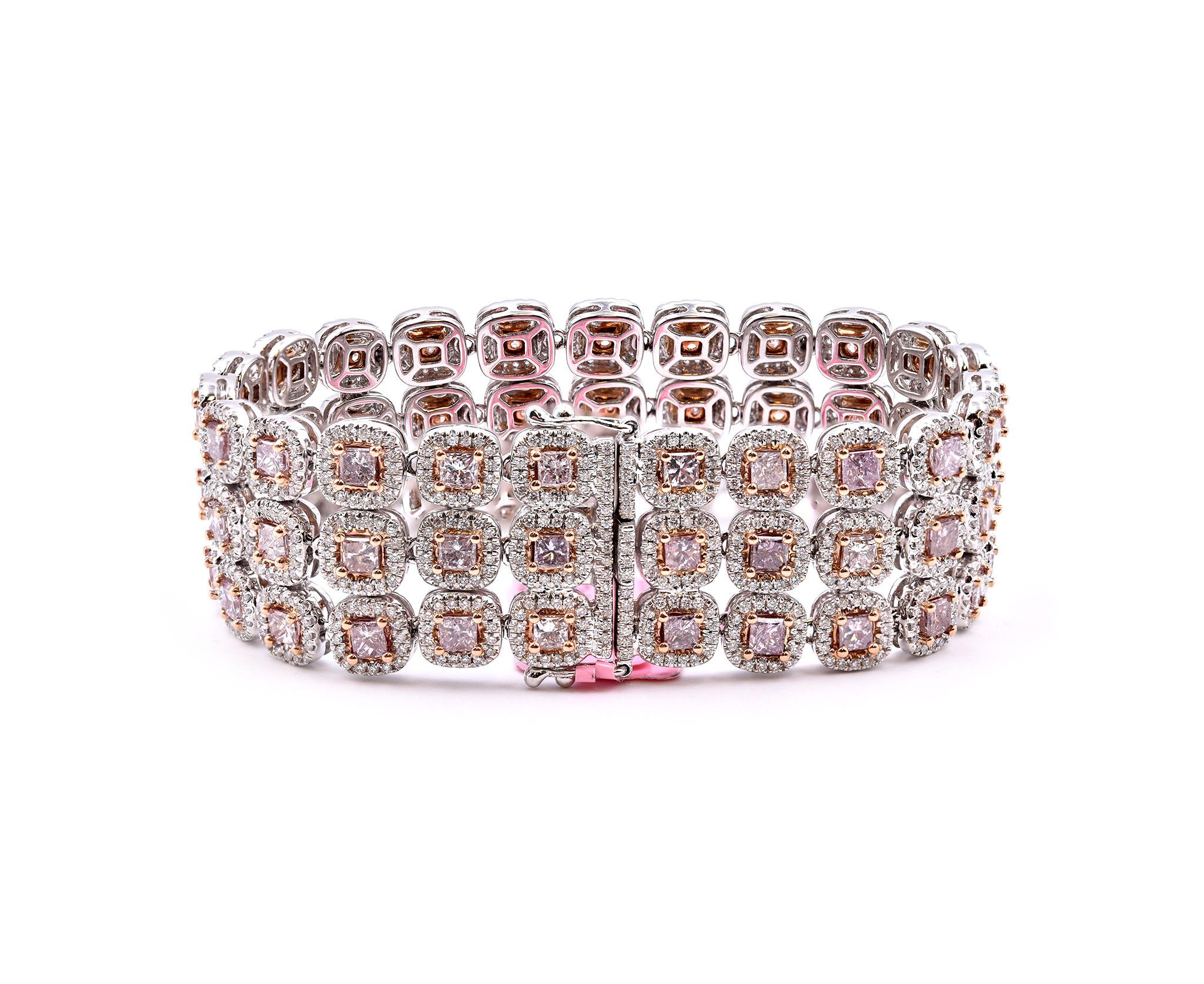 Designer: custom design
Material: 18k white gold
Diamonds: 1210 round brilliant cut = 4.45cttw 
Color: G
Clarity: VS1
Pink Diamonds: 69 round brilliant cut = 71.15cttw
Color: pink
Dimensions: bracelet is will fit up to a 7-inch wrist and it is