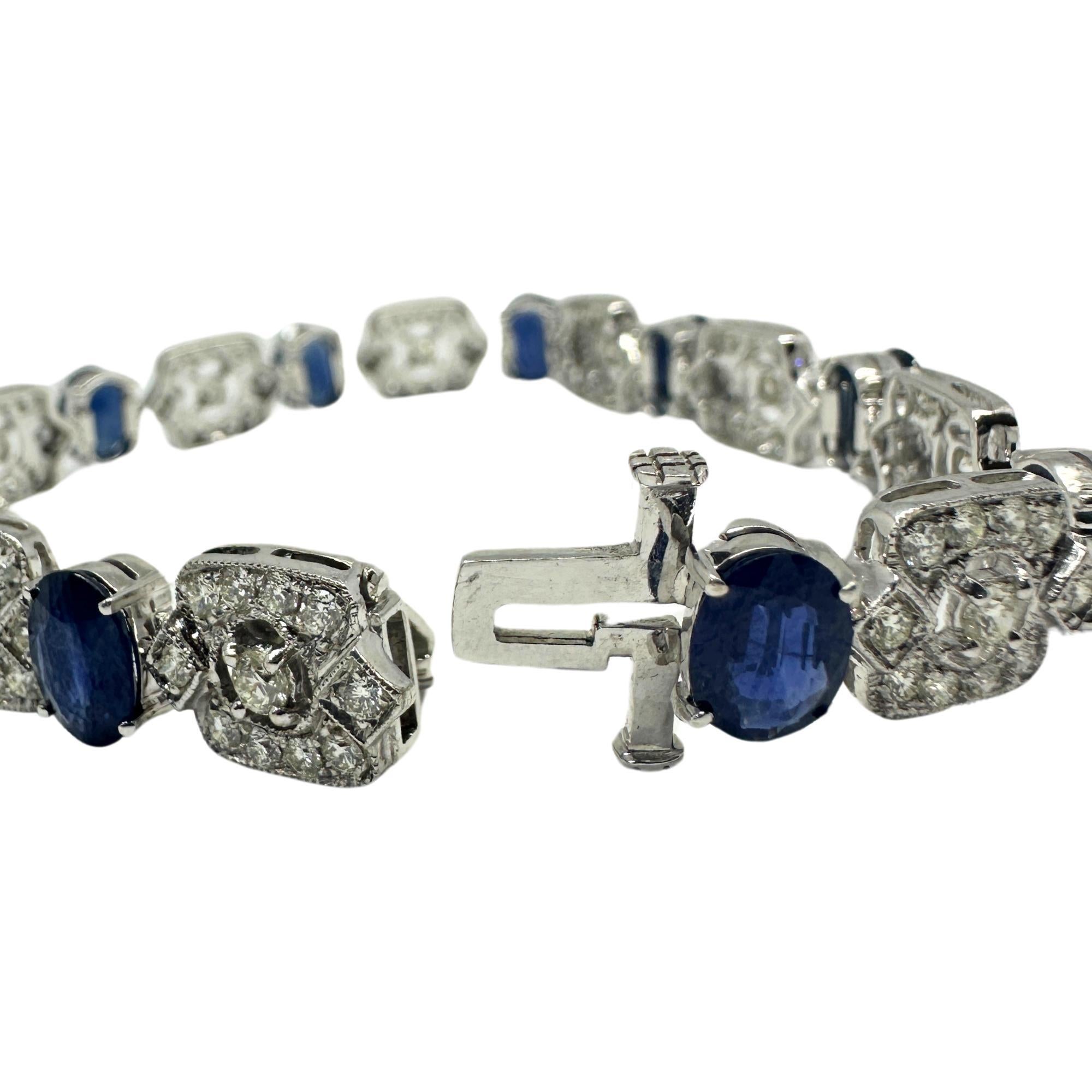 Bracelet en or blanc 18 carats avec diamants et saphirs
Condit : En bon état avec quelques légères usures de surface dues à l'âge.
Longueur : 7,5 pouces
Marquage : 