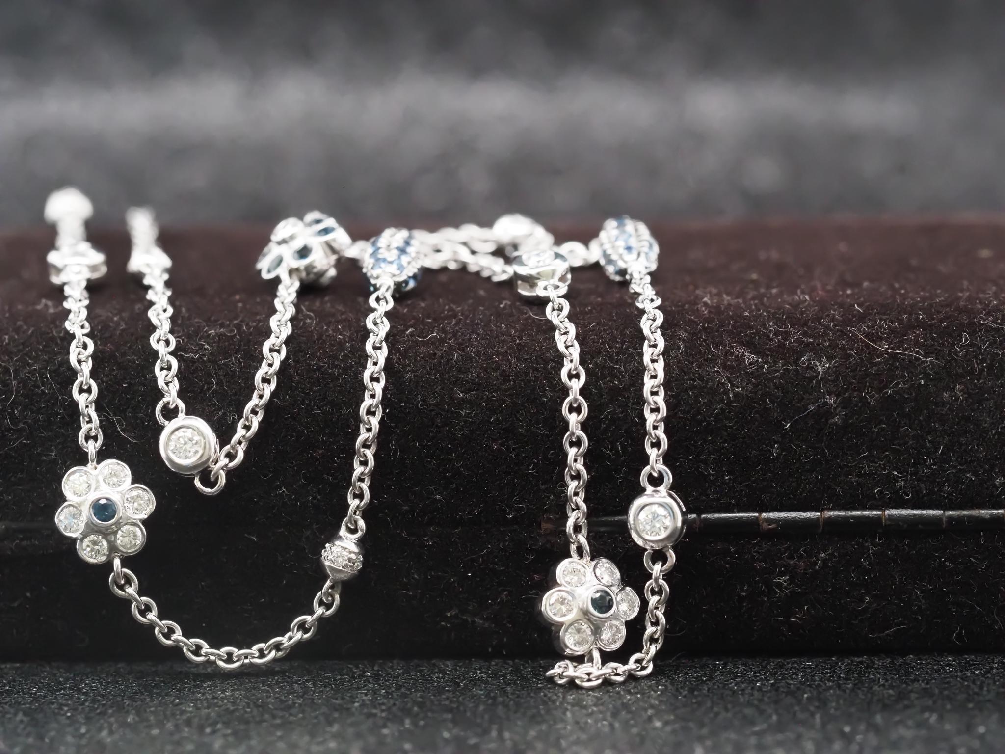 Item Details:
Metal Type: 18K White Gold [Hallmarked, and Tested]
Weight: 14.8g
Maker: Norman Covan
Diamond Details:
Weight: 2.00ct total weight
Cut: Round Brilliant
Color: F
Clarity: VS
Side Sapphire Details:
Weight: .50ct total weight
Cut: Round