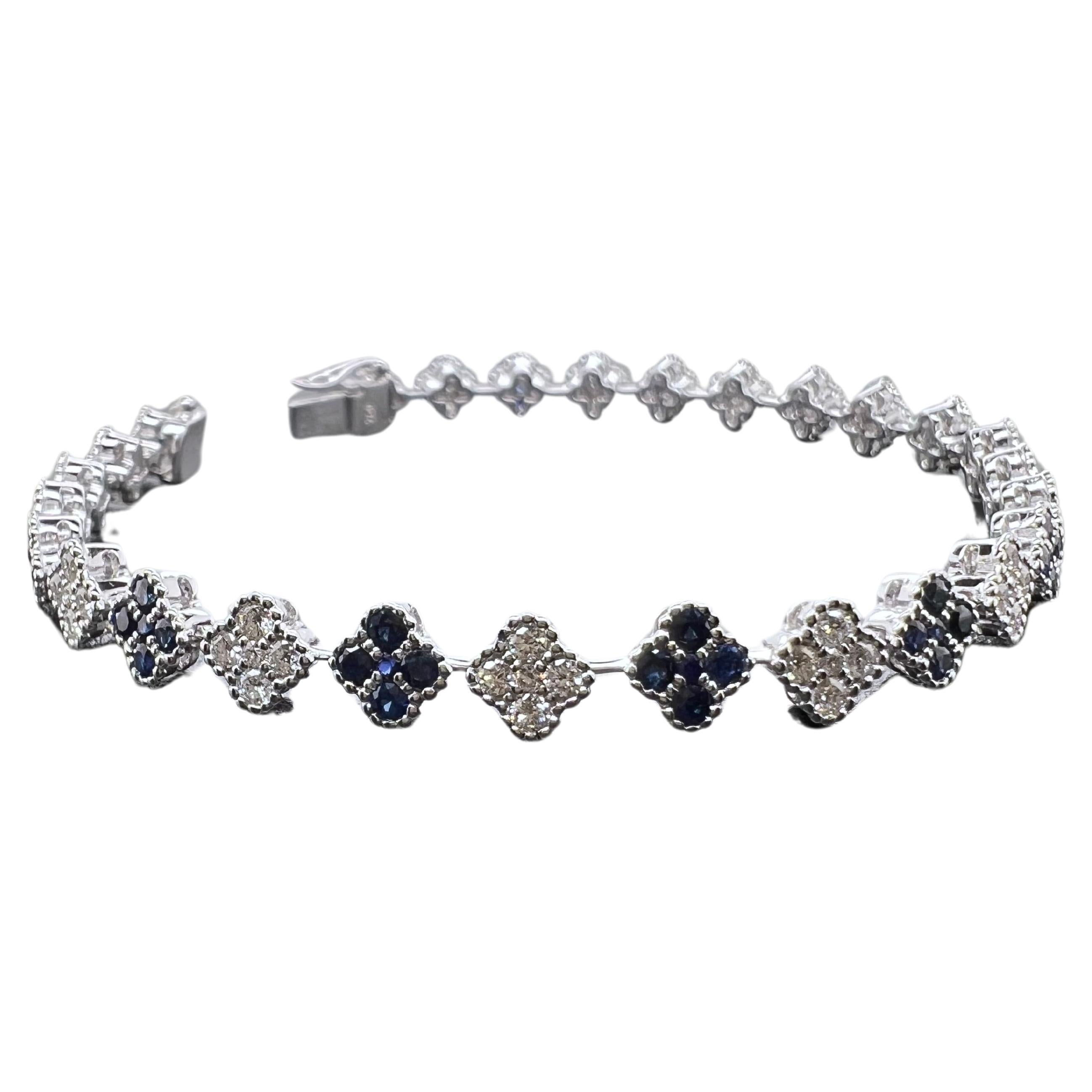 18k white Gold Diamond and Sapphire Clover Style Tennis Bracelet