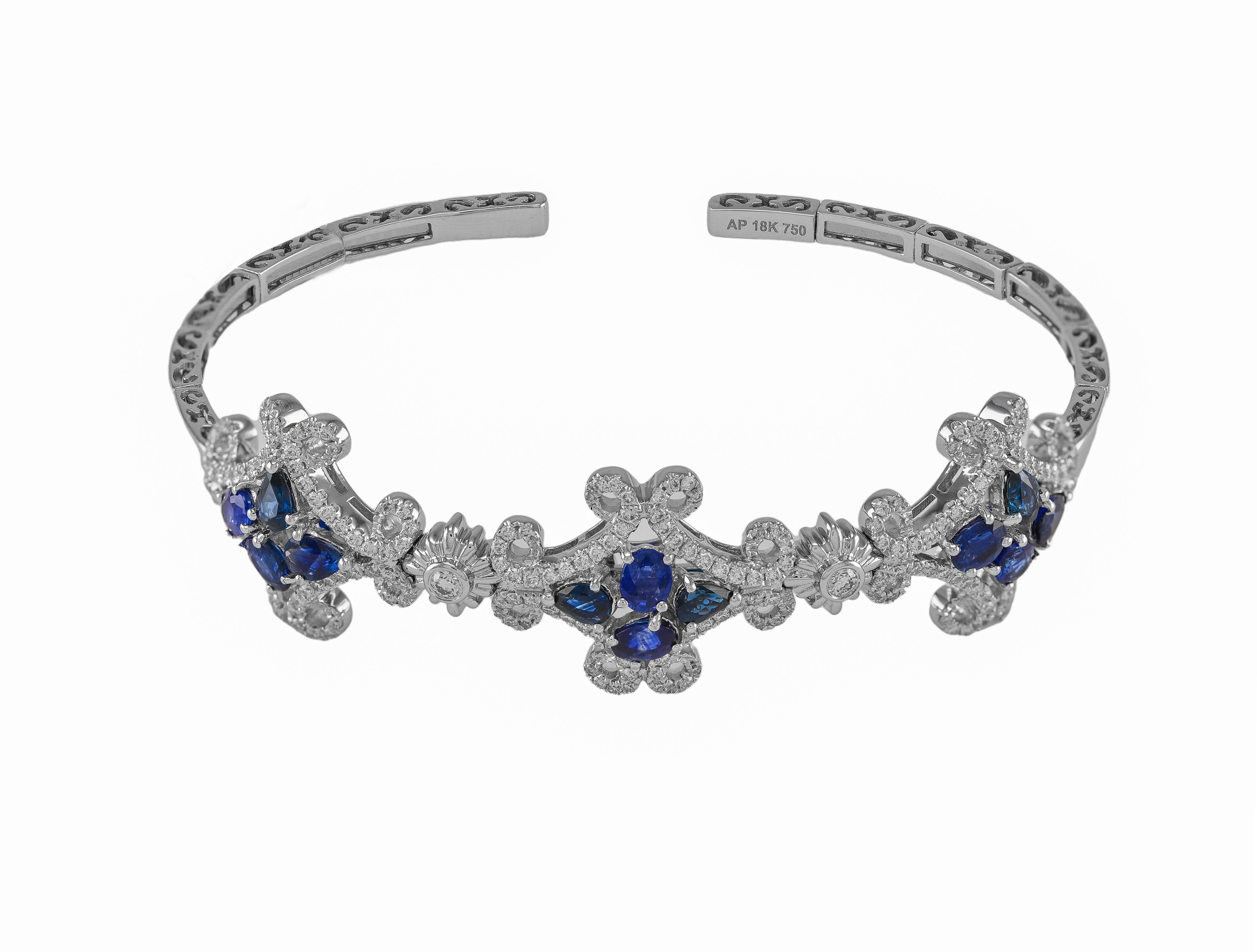 Taglio ovale Bracciale a bracciale con diamanti e zaffiri in oro bianco 18 carati in vendita