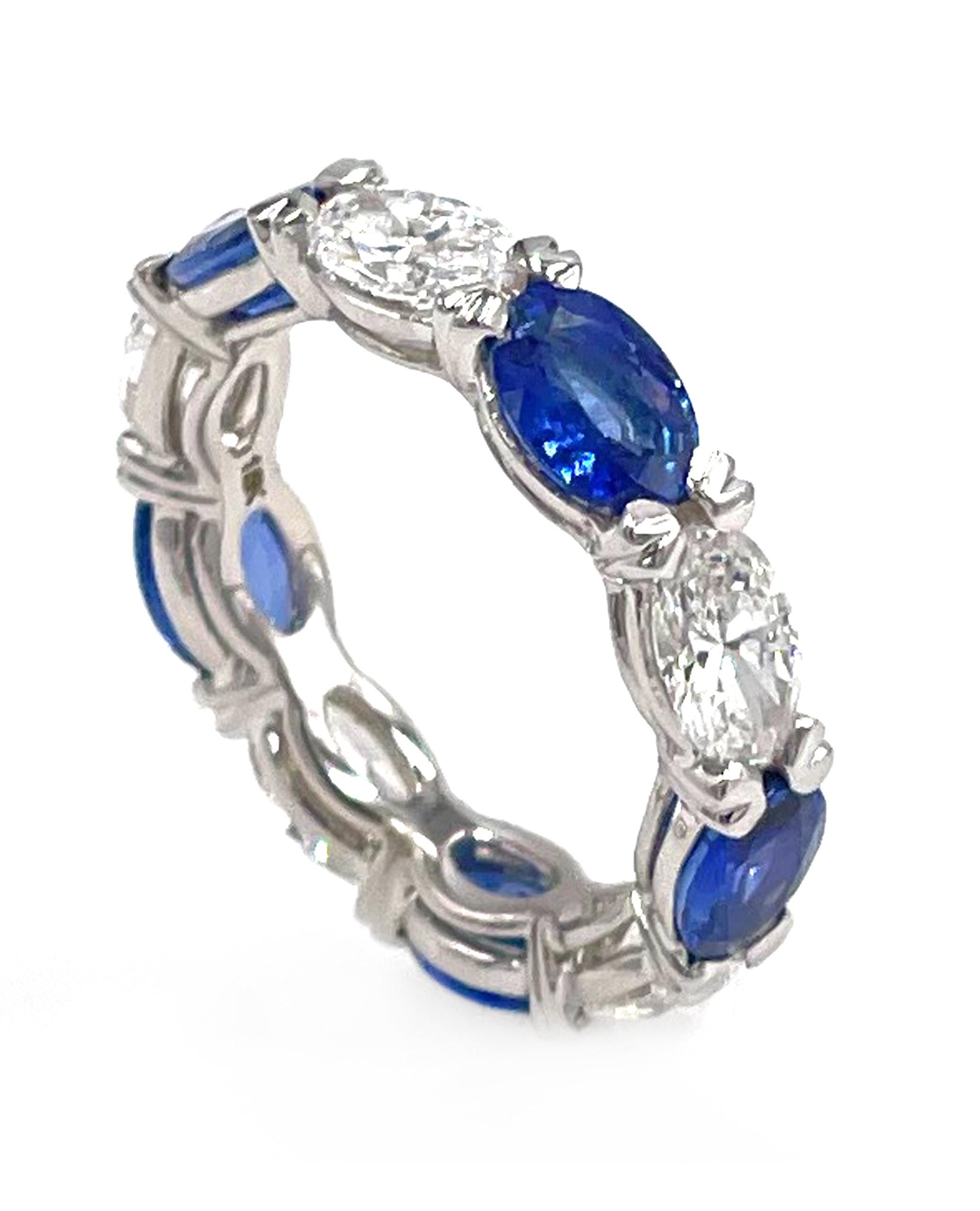 18k white gold East-West set eternity ring with 5 oval diamonds totaling 2.18 carats and 5 oval blue sapphires totaling 3.63 carats.

* Finger size 6.25