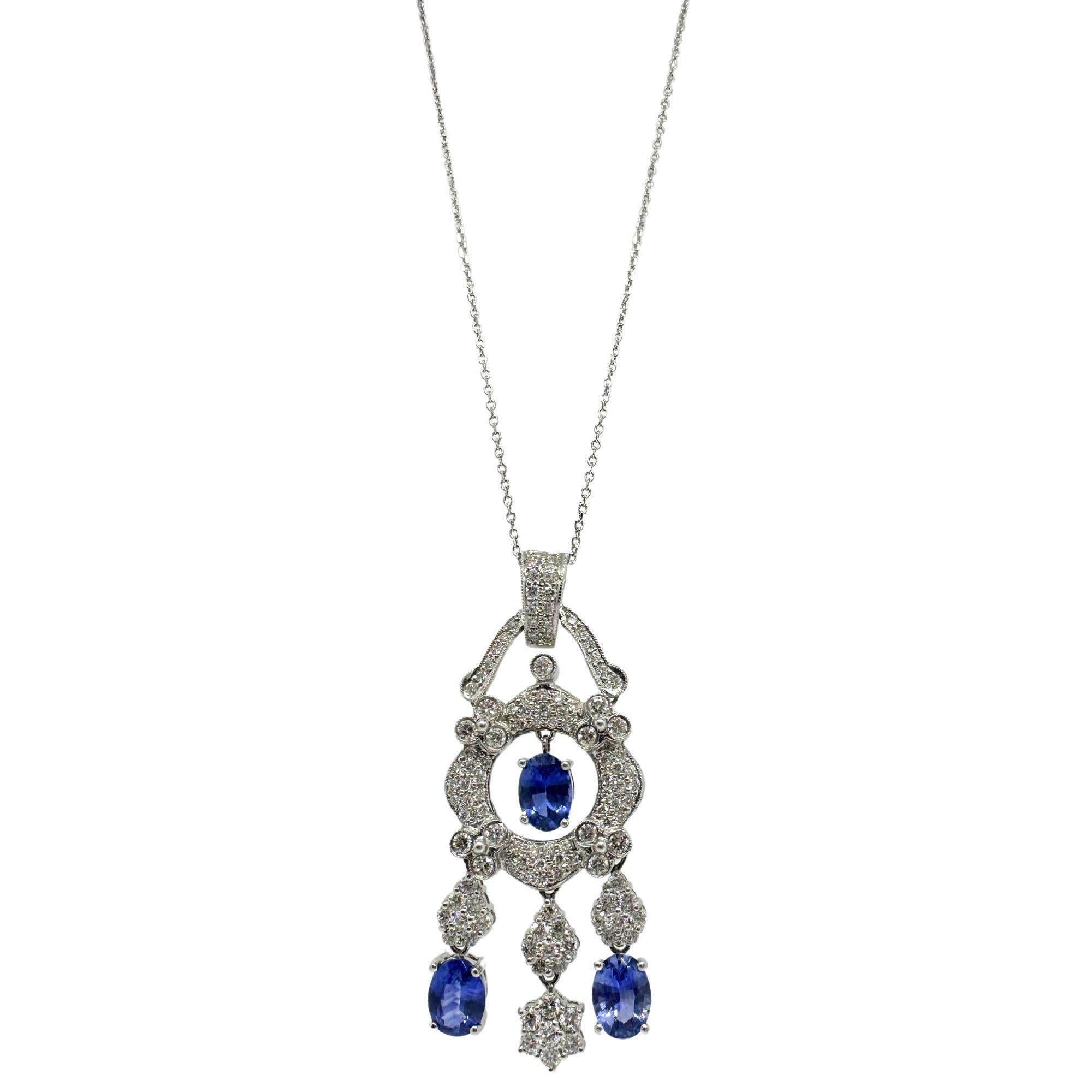 18K White Gold Diamond and Sapphire Pendant Necklace
Condition: In good condition with some minor surface wear consistent with age.
Length: 16 inch long chain, 2 inch pendant
Metal: 18k White Gold
Weight: 12.2 grams
Diamonds: 2.13 carats
Sapphire: