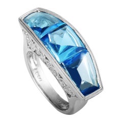 18 Karat White Gold Diamond and Three Topazes Ring