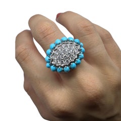 Anello con diamanti e turchesi a grappolo in oro bianco 18 carati