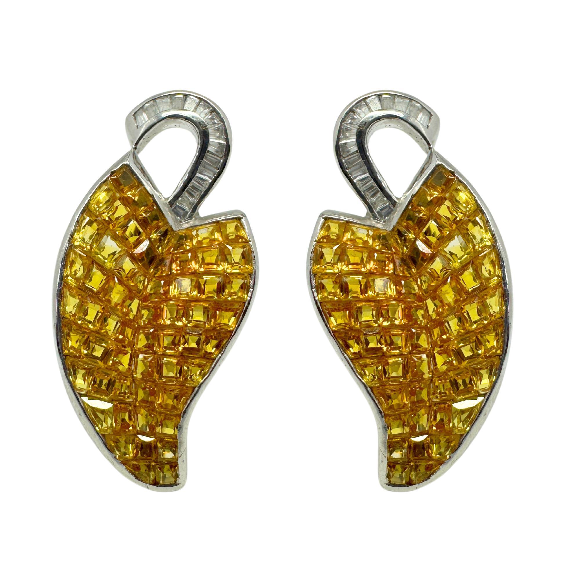 Showcasing pumpkin like, or leaflike shaped 18k White Gold Diamond and Yellow Sapphire Earrings. Perfect for Fall. 

18k White Gold Diamond and Sapphire Earrings
Condition: In good condition with some minor surface wear consistent with