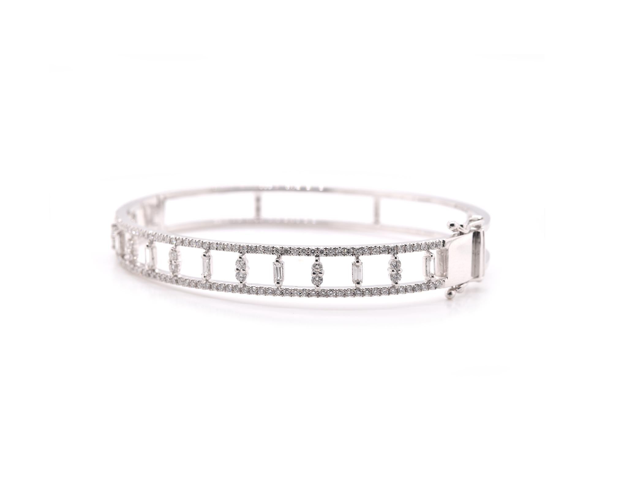 Designer: Estate Watch and Jewelry
Material: 18k white gold
Diamonds: 128 round brilliant cuts and 7 baguette cuts = 1.20cttw
Color: G
Clarity: VS2
Dimensions: bracelet will fit up to a 6 ½-inch wrist, measures 7.15mm in width
Weight: 15.26 grams
