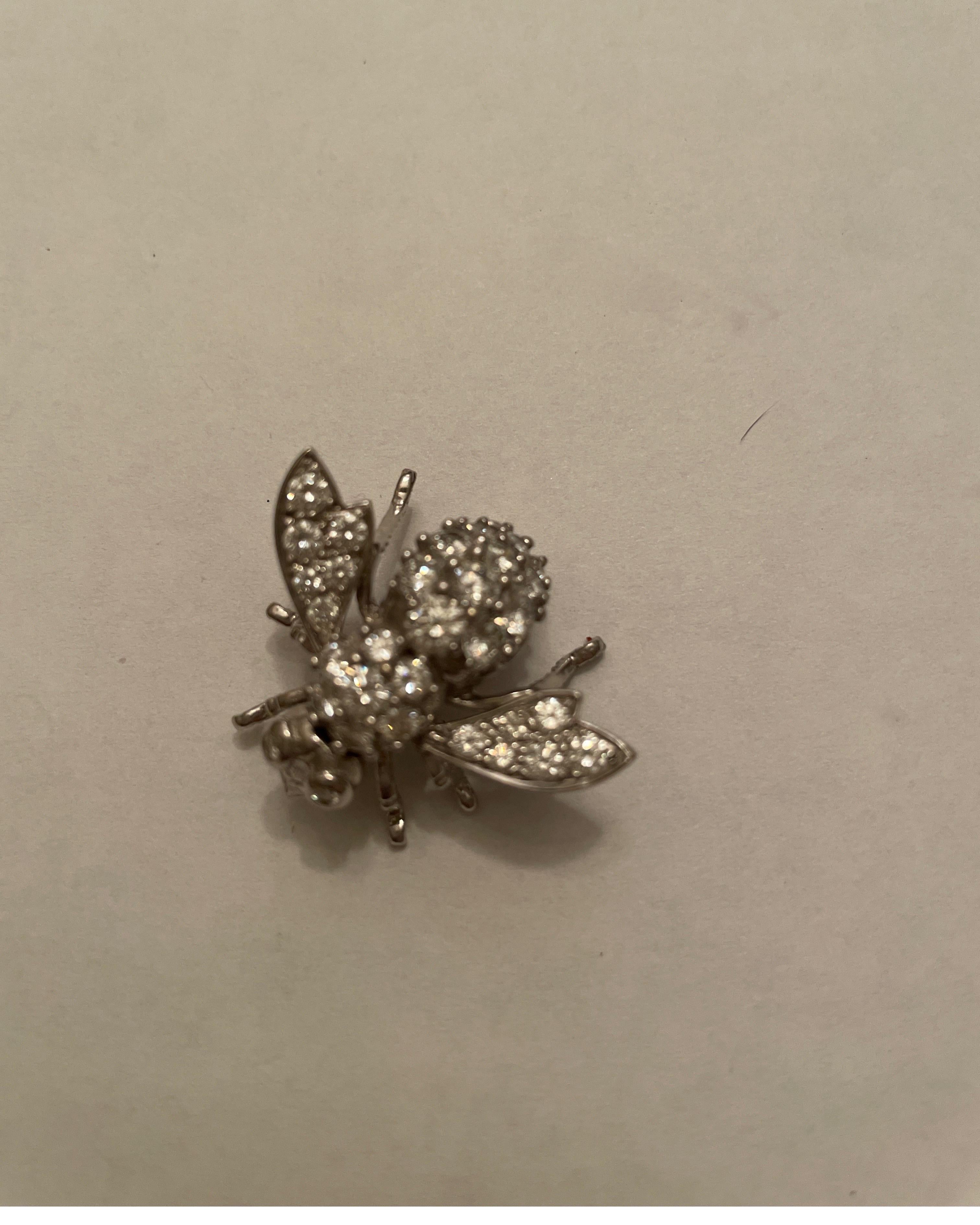 18K white gold diamond bee pin, prong set with 33 full cut round diamonds weighing 2.63cts
Last retail $9500