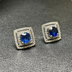 Boucles d'oreilles en or blanc 18K diamant et saphir bleu