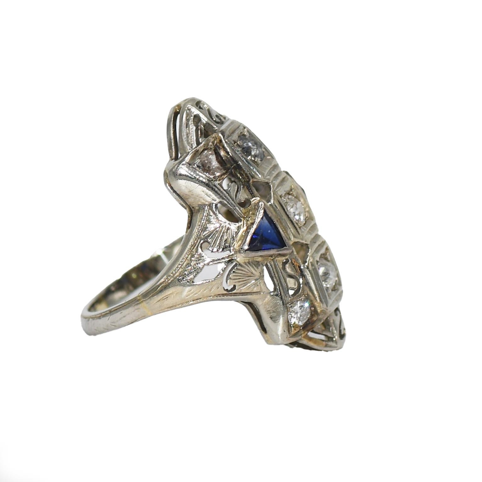 18K White Gold Diamond & Blue Spinel Art Deco Ring 3.4g
Ladies antique, art deco diamond and blue spinel ring with 18k white gold setting.
Tests 18k with an electronic tester and weighs 3.4 grams.
The diamonds are mostly old-mine cuts, approximately
