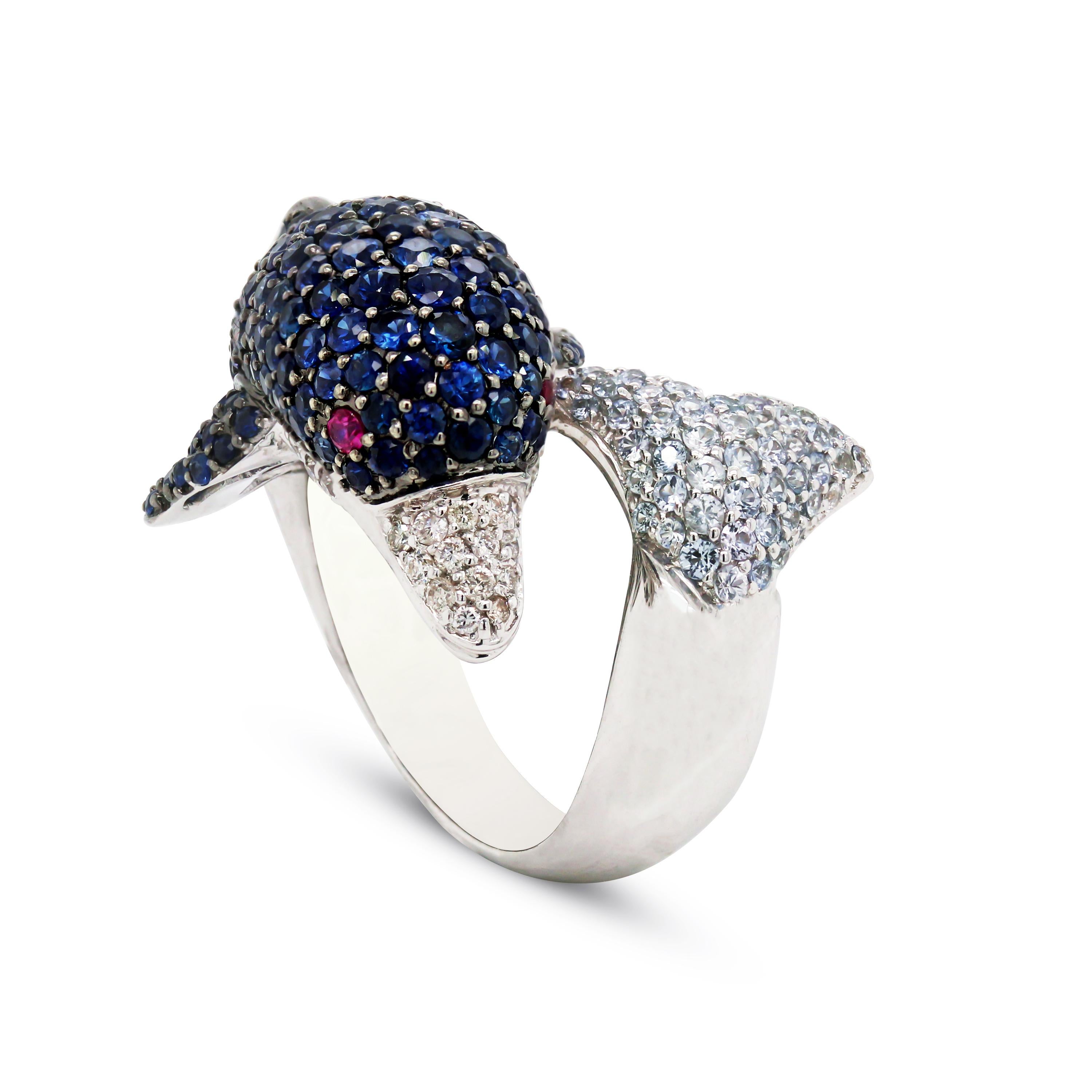 18 Karat White Gold and Diamonds Blue White Sapphires Ruby Dolphin Bypass Ring

This unique ring features a 3D dolphin with blue sapphires white sapphires and diamonds

0.25 carat G color, VS clarity diamonds
0.75 carat white sapphires
3.50 carat