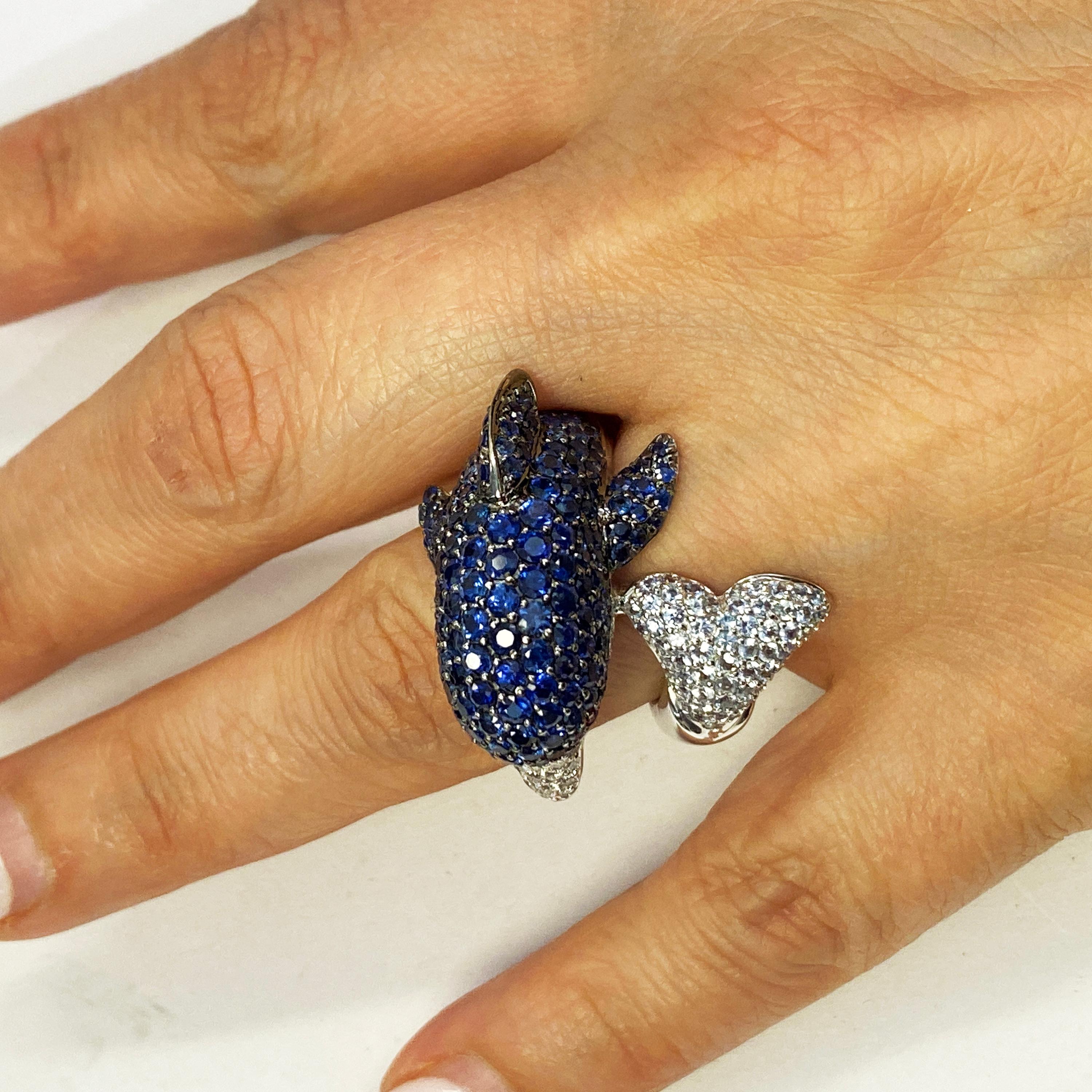18 Karat White Gold and Diamonds Blue White Sapphires Ruby Dolphin Bypass Ring In Excellent Condition For Sale In Boca Raton, FL