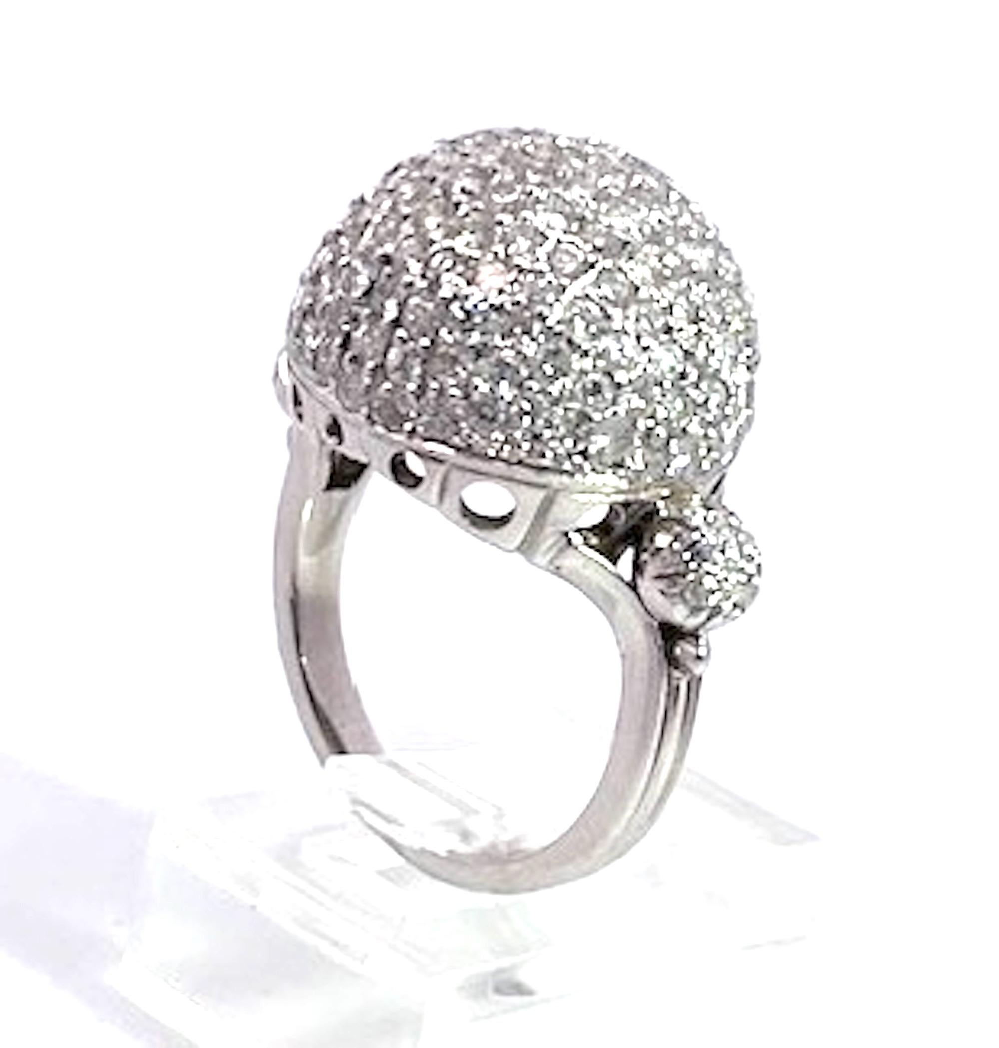 Ths Boule or Dome ring is sparkly and has 3.95 cts of Diamonds on a high dome setting.  This ring comes out of Italy and really is special.  When you need a cocktail ring to sparkle and dance this is the one.  The ring is 2 cm wide and on each side