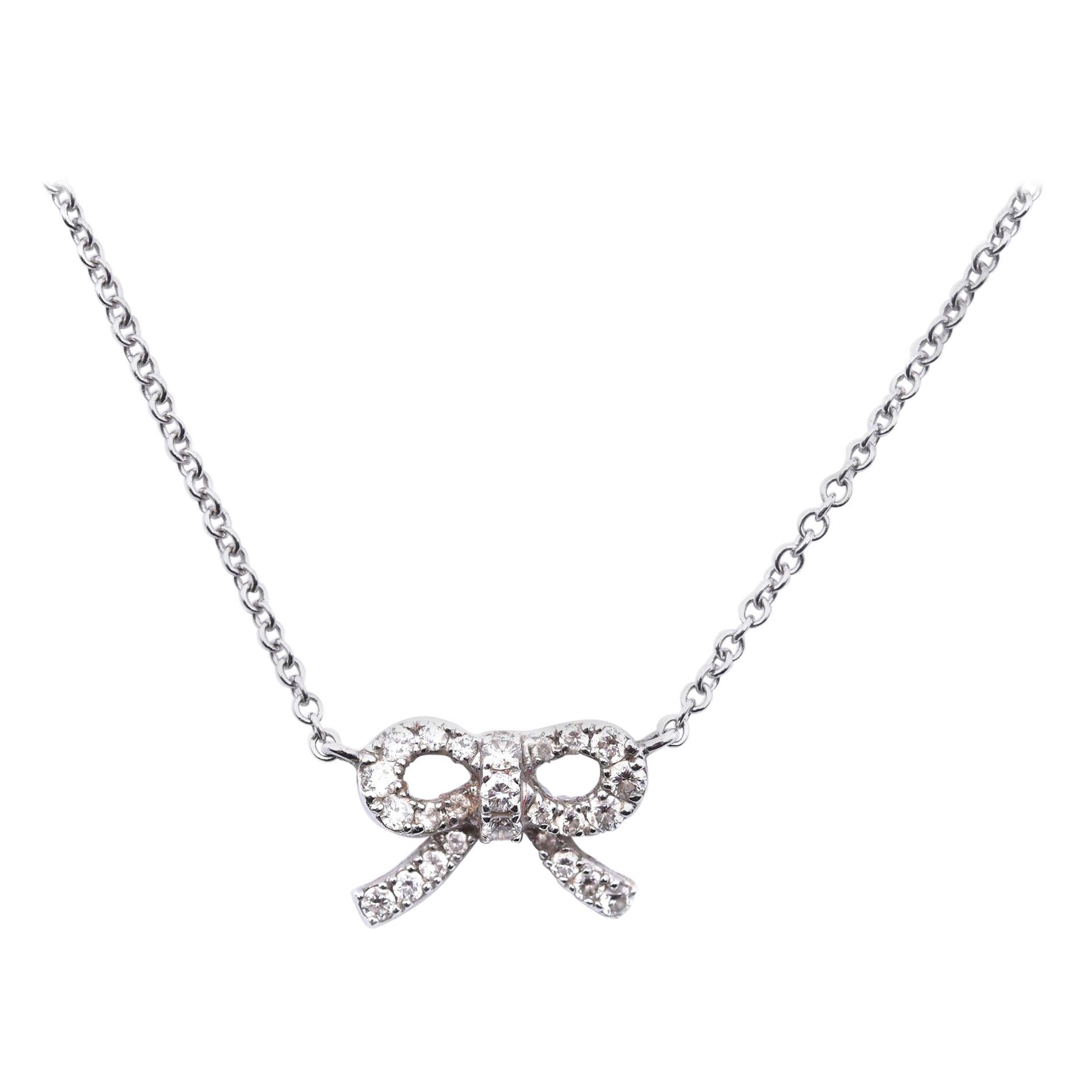 18 Karat White Gold Diamond Bow Necklace For Sale