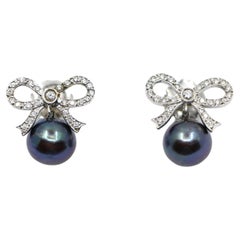 Vintage 18K White Gold Diamond Bow Tie Black Pearl Earrings