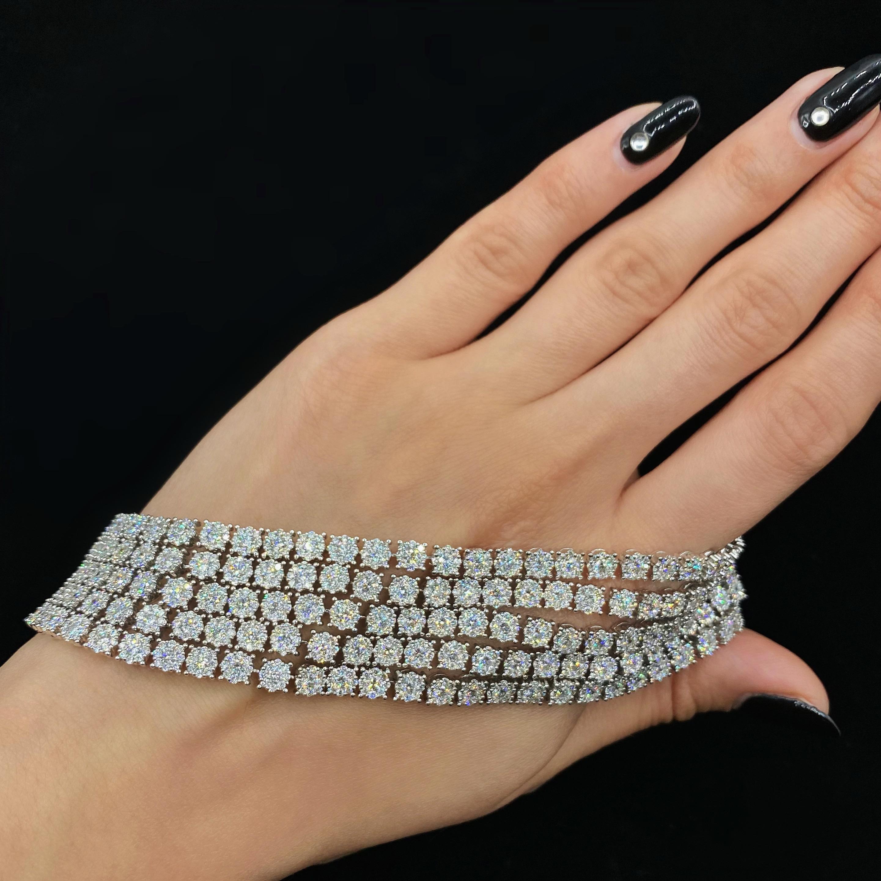 Armband aus 18 Karat Weißgold mit 19,95 Karat Gesamtgewicht an Diamanten

Gefertigt aus 18k Weißgold

19,95ct Gesamtgewicht der Diamanten

1710 Steine

Diamanten geschliffen: Rund

Diamanten: Natürlich