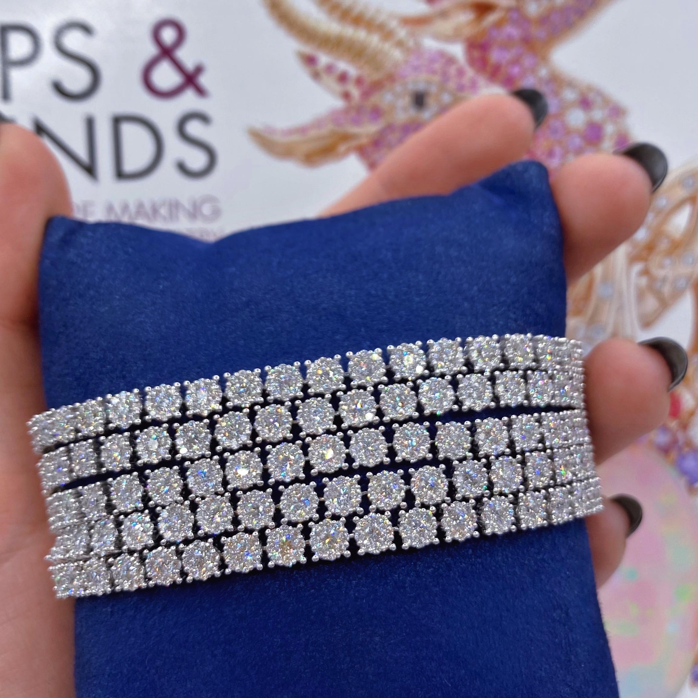 18k White Gold Bracelet features 19.95ct of Total Diamond Weight

Crafted in 18k White Gold
19.95ct total diamond weight
1710 stones
Diamonds cut: Round
Diamonds: Natural