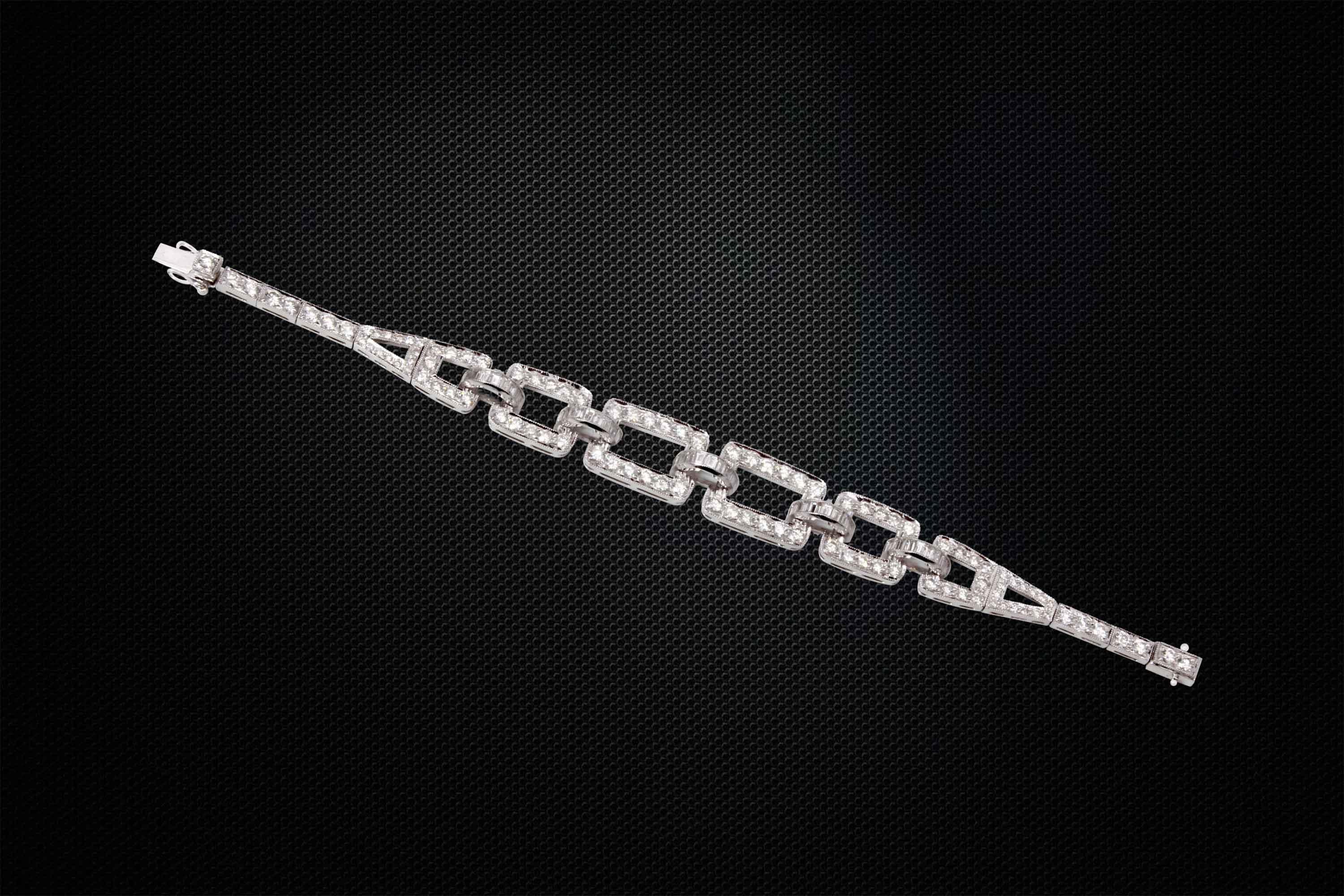 A gorgeous bracelet that can be worn everyday but still dressy enough for evening.
It has 105 pcs of round cut white diamonds weighing 6.22 carats and 46 pcs of  baguette cut diamonds weighing 1.84 carats set in 18k white gold.
Handcrafted in 18K