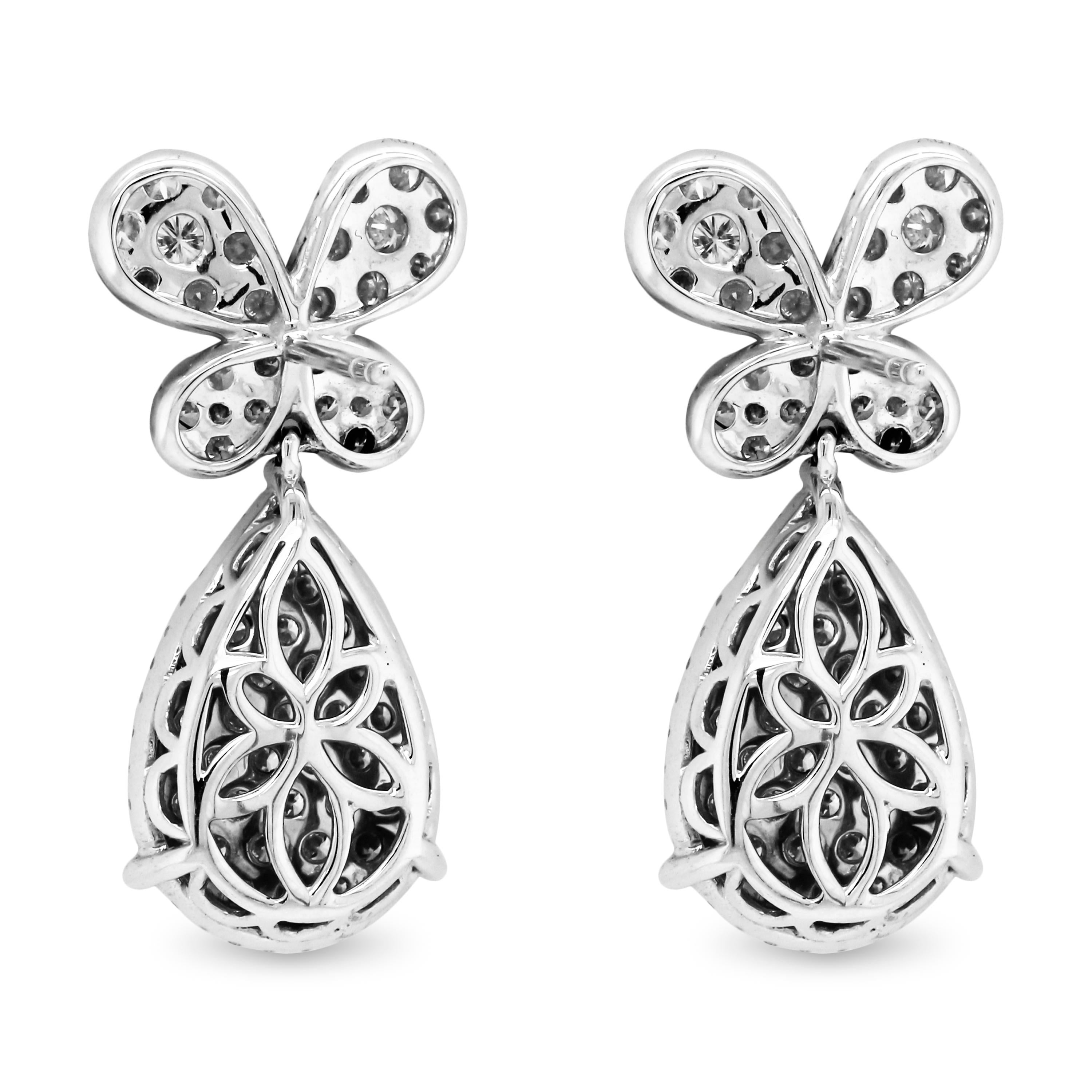 18K White Gold Diamond Butterfly and Pear Shape Design Drop Earrings

A unique pair of earrings featuring butterfly tops with a diamond pear shape design drop.

3.40 carat G color, VS clarity diamonds total weight

Earrings are 1.13 inch length by