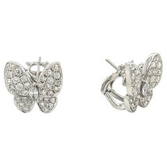 Boucles d'oreilles papillon en or blanc 18K avec diamants 