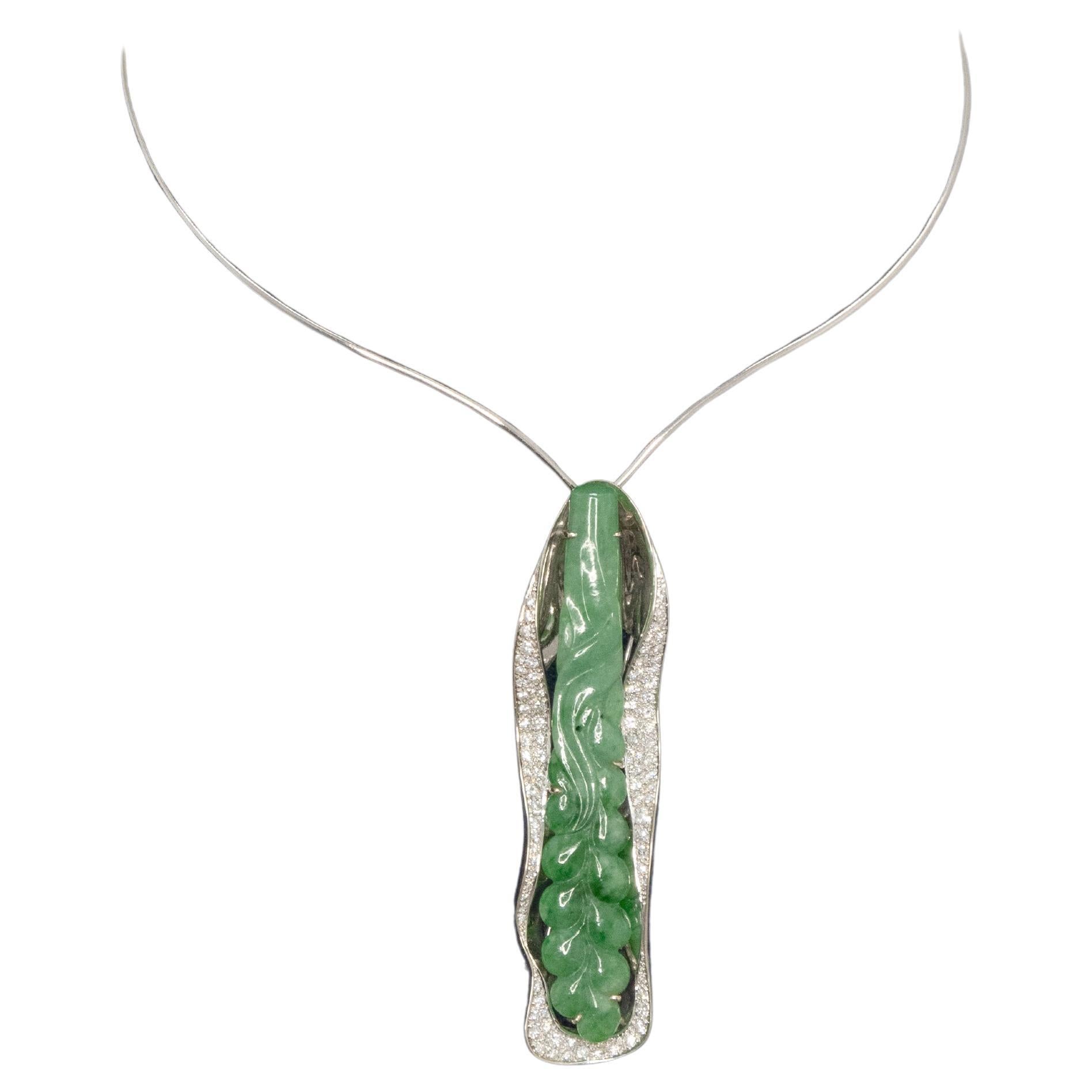18K white gold diamond carved jade pendant also can wear as a brooch.
Surrounding with 84 round brilliant cut diamonds approximate 2.00 carats in G-H color VS-SI clarity with a 18K white gold wire choker necklace

Approximate Weight: 38.8