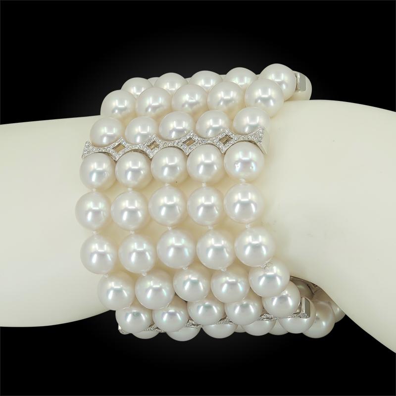 Round Cut 18 Karat White Gold Diamond, Carved Sapphire, Pearl Bracelet