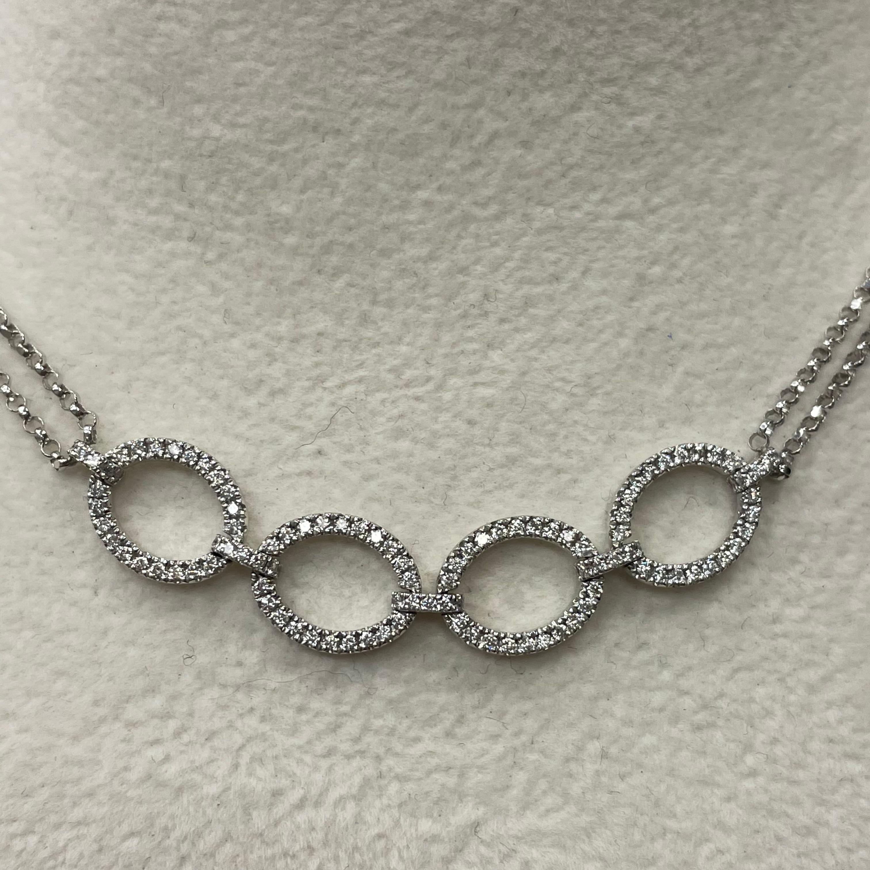 This beautiful diamond choker necklace is composed with two rows of chains . Totalling 113 pieces of brilliant-cut round diamonds, weighing 0.67 carats. Made in 18k white gold. It makes you impressive anytime any occasion.

