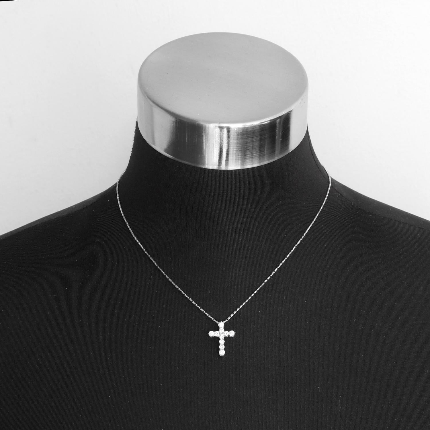 18K White Gold Diamond Cross Necklace - Beautiful cross set in 18K White gold measuring 1 cts of diamonds. Diamond color HI, Clarity VS1-2,  Bright white. On a chain measuring 16 inches with an enhancer. Pre-owned with custom box.