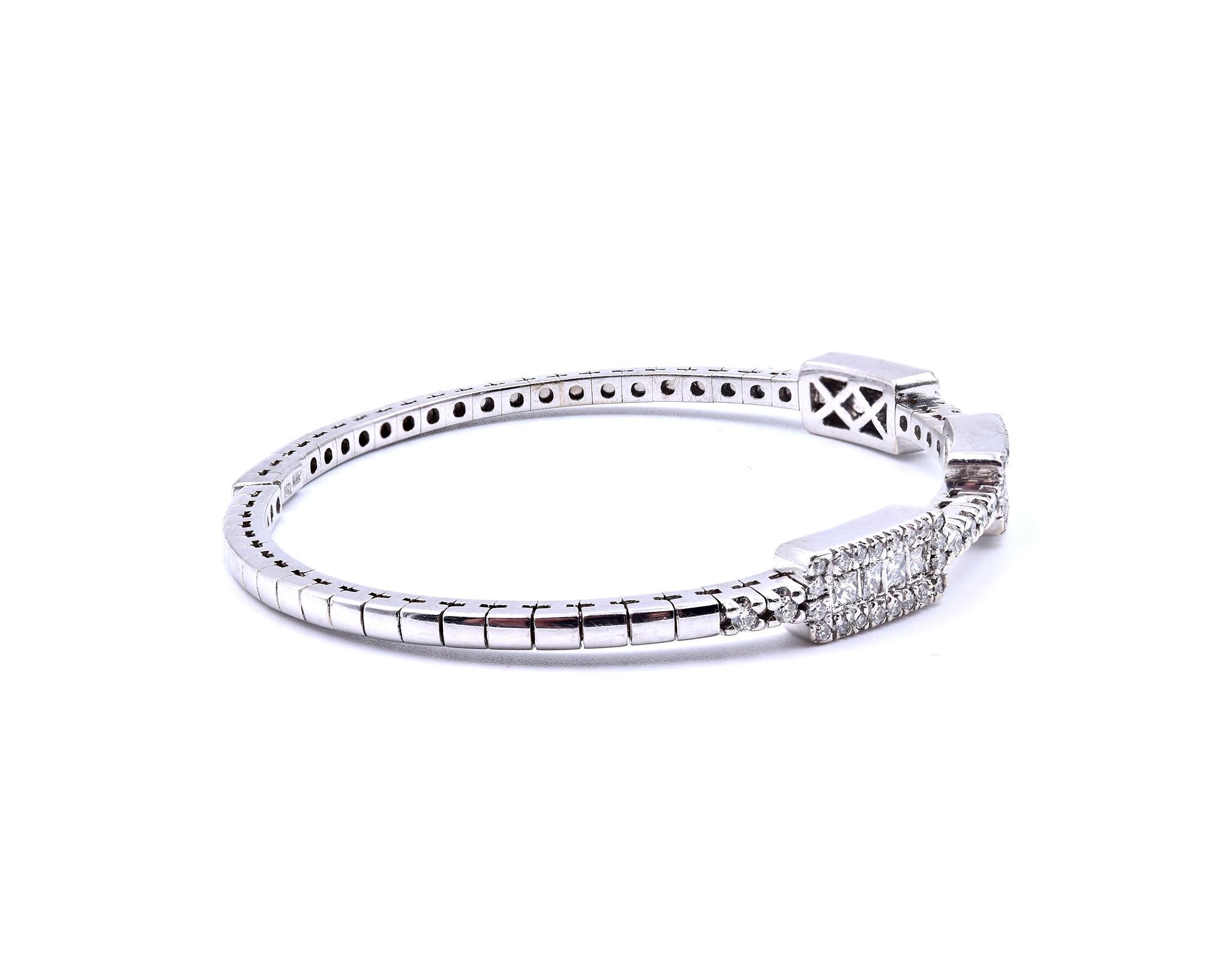 Designer: custom designed
Material: 18k white gold
Diamonds: 12 princess cut= .36cttw
Color: G
Clarity: VS
Diamonds: 72 round brilliant cut= 1.20cttw
Color: G
Clarity: VS
Dimensions: bracelet is 6 ½-inches long and it is 6mm wide
Weight: 20.28 grams
