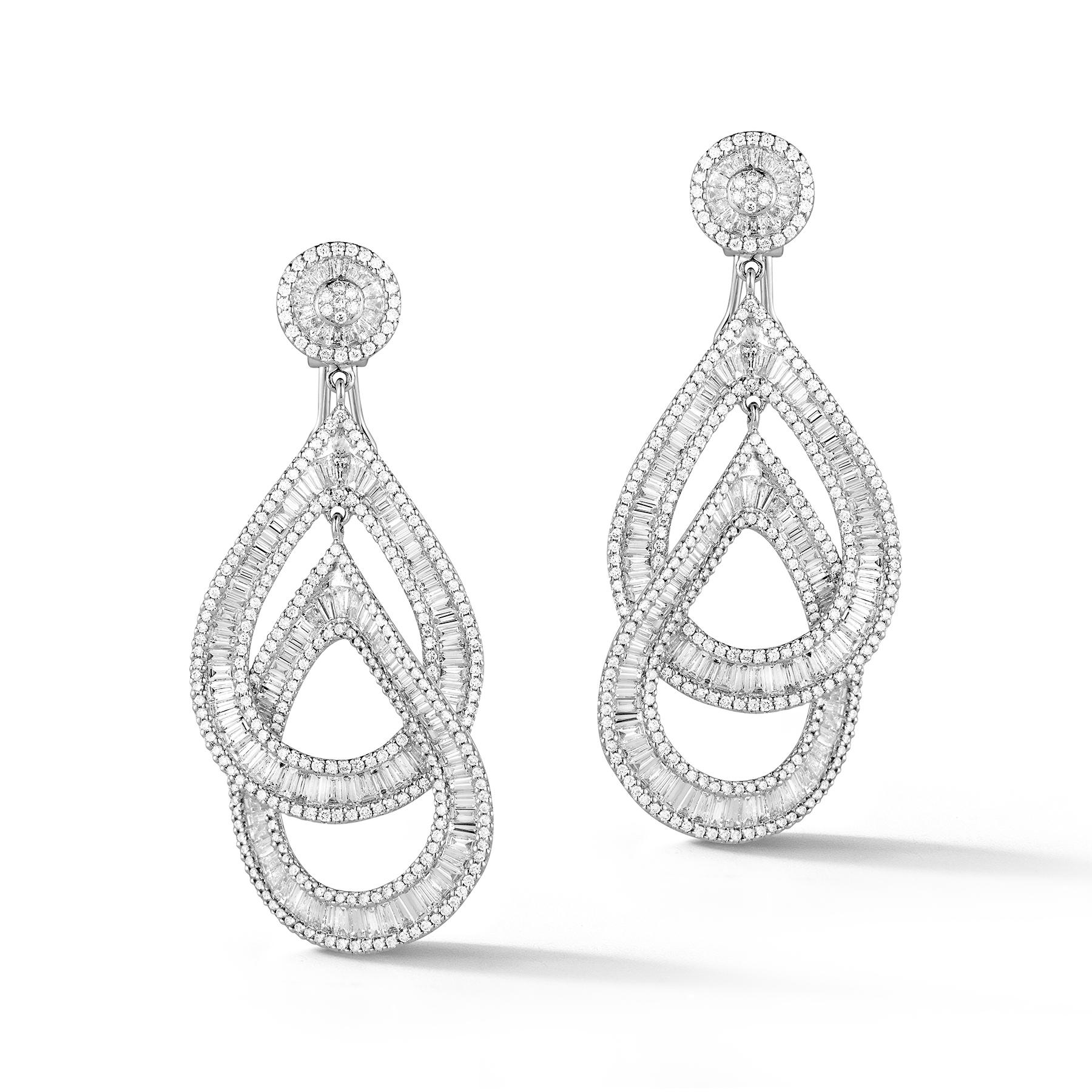 Stunning 18K White Gold Dangle Earrings with a Dazzling 610 White Round Diamonds weighing 3.71 Carats and 263 White Baguette Diamonds weighing 9.06 Carats.