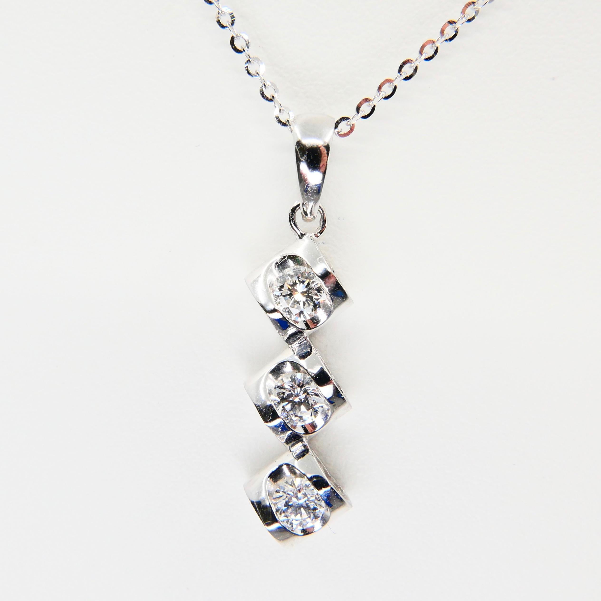 18 Karat White Gold and Diamond Drop Pendant Drop Necklace, Heart Shaped Motif In New Condition In Hong Kong, HK