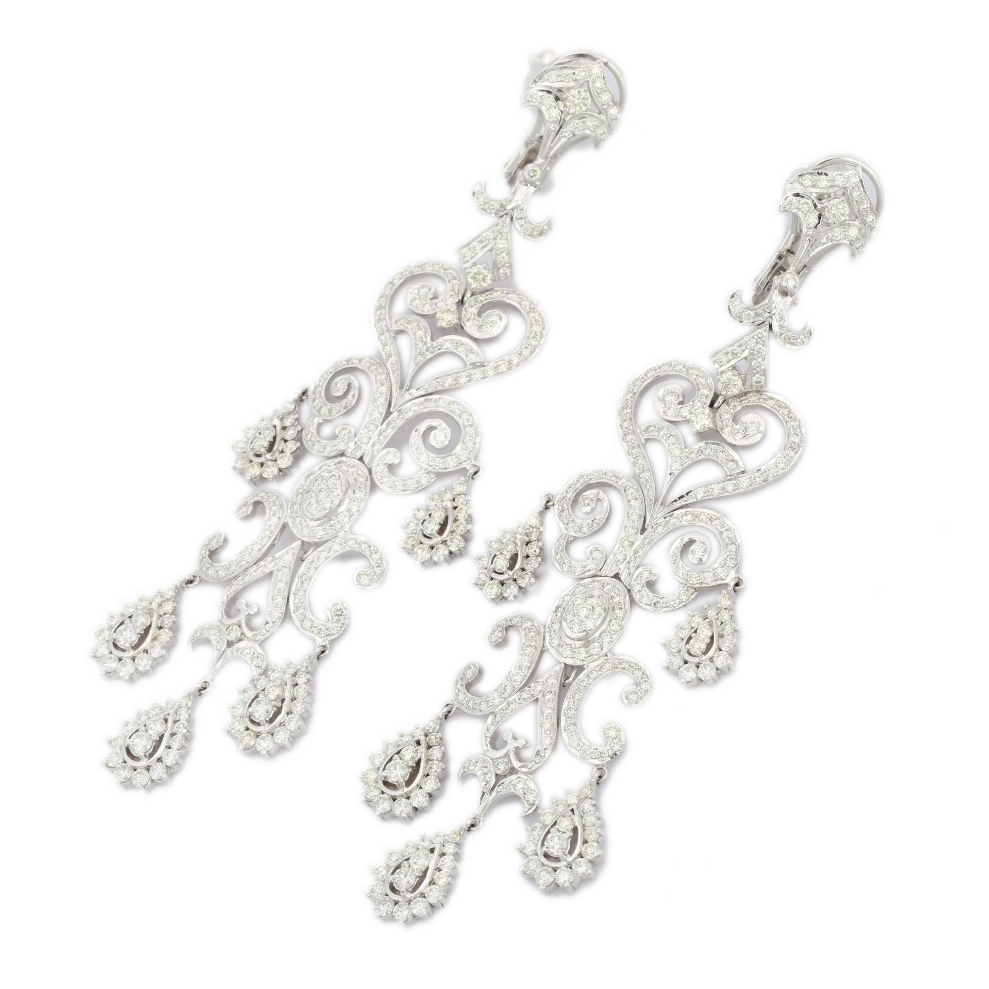 Genuine 10.76 Carats Diamond Chandelier Earrings in 18K Gold to make a statement with your look. You shall need dangle earrings to make a statement with your look. These earrings create a sparkling, luxurious look featuring round cut diamond.
April